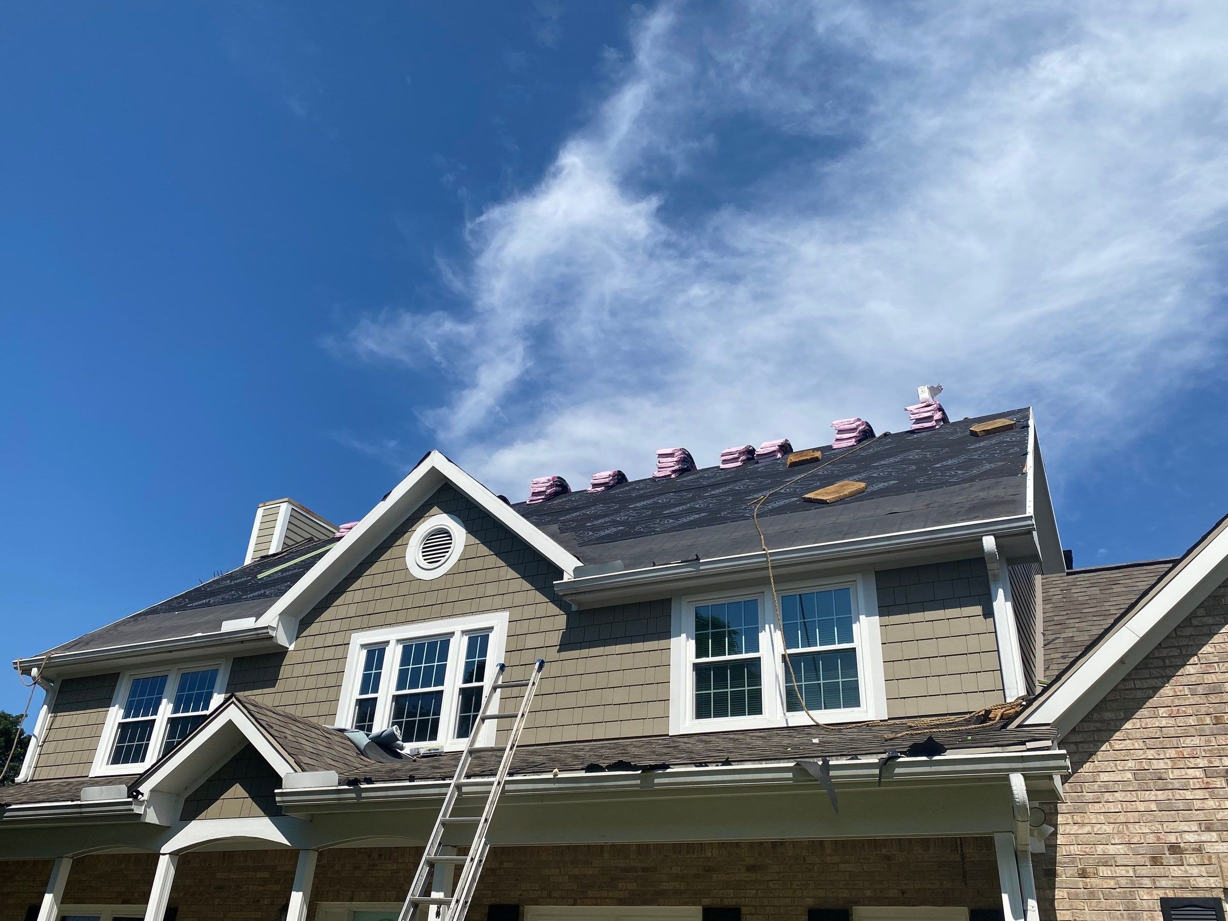Shingle bundles loaded along the upper ridge above the front, Yellow Springs, Ohio.