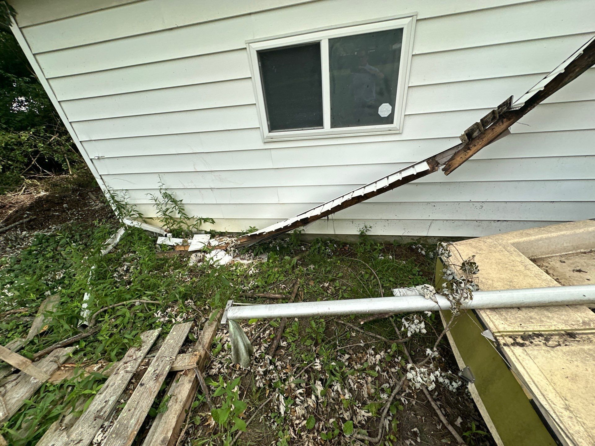 Rotted fascia and a fallen soffit along the detached garage, Beavercreek, Ohio.