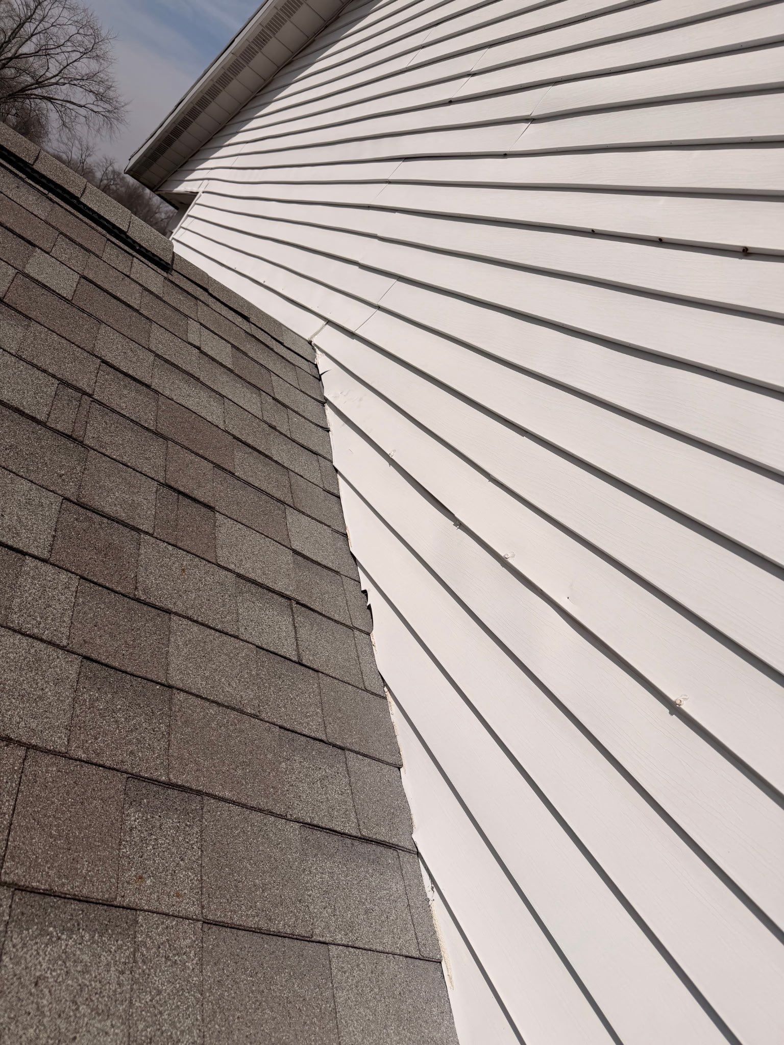 Roof slope meeting the gable siding