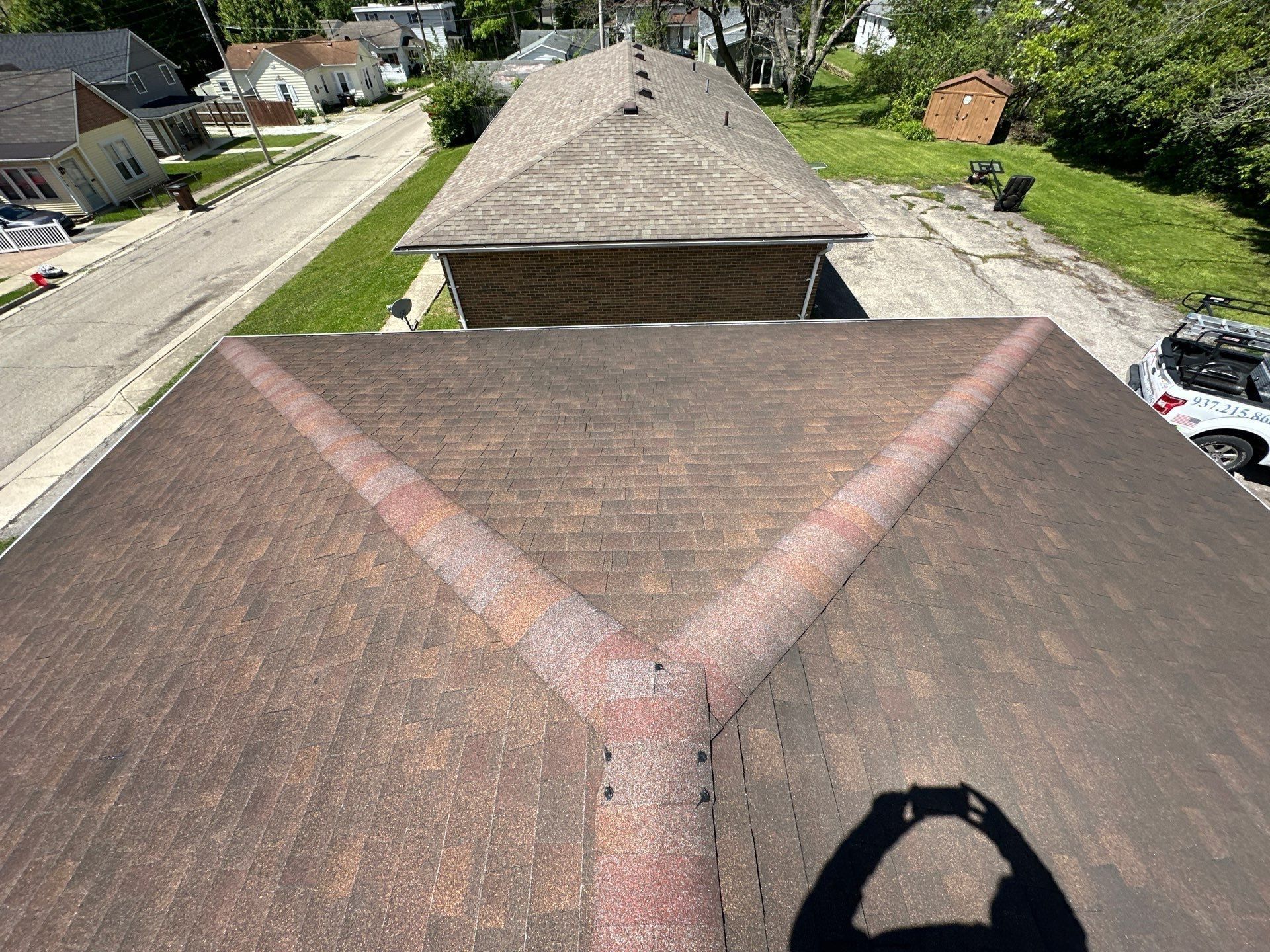 The hip roof from the peak, looking down the street, Xenia, Ohio.