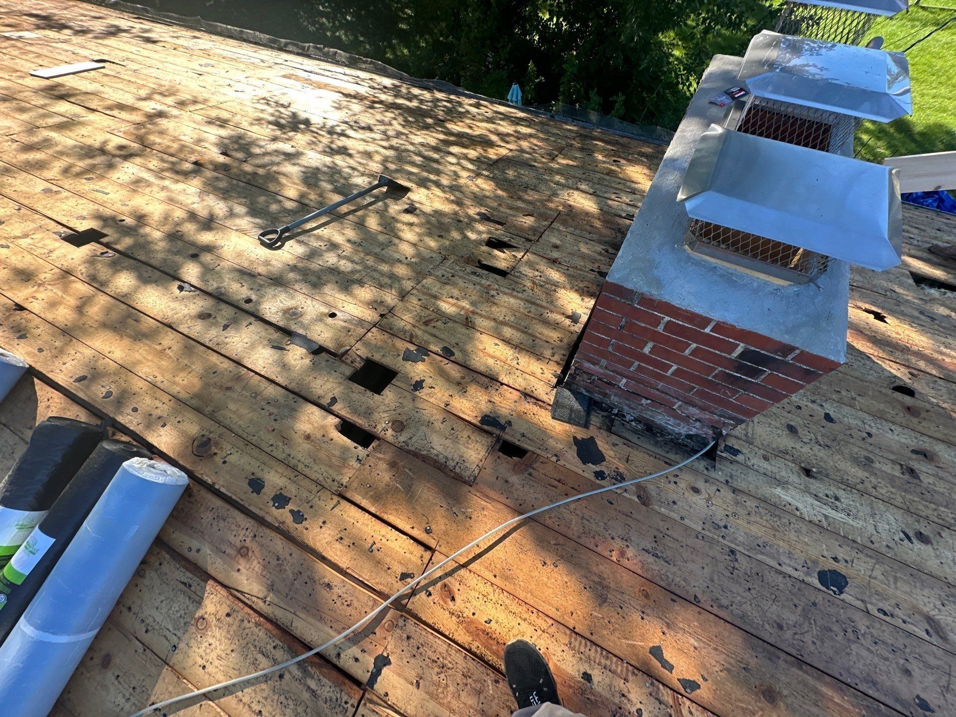 The plank deck around the capped chimney before the repairs, Kettering, Ohio.