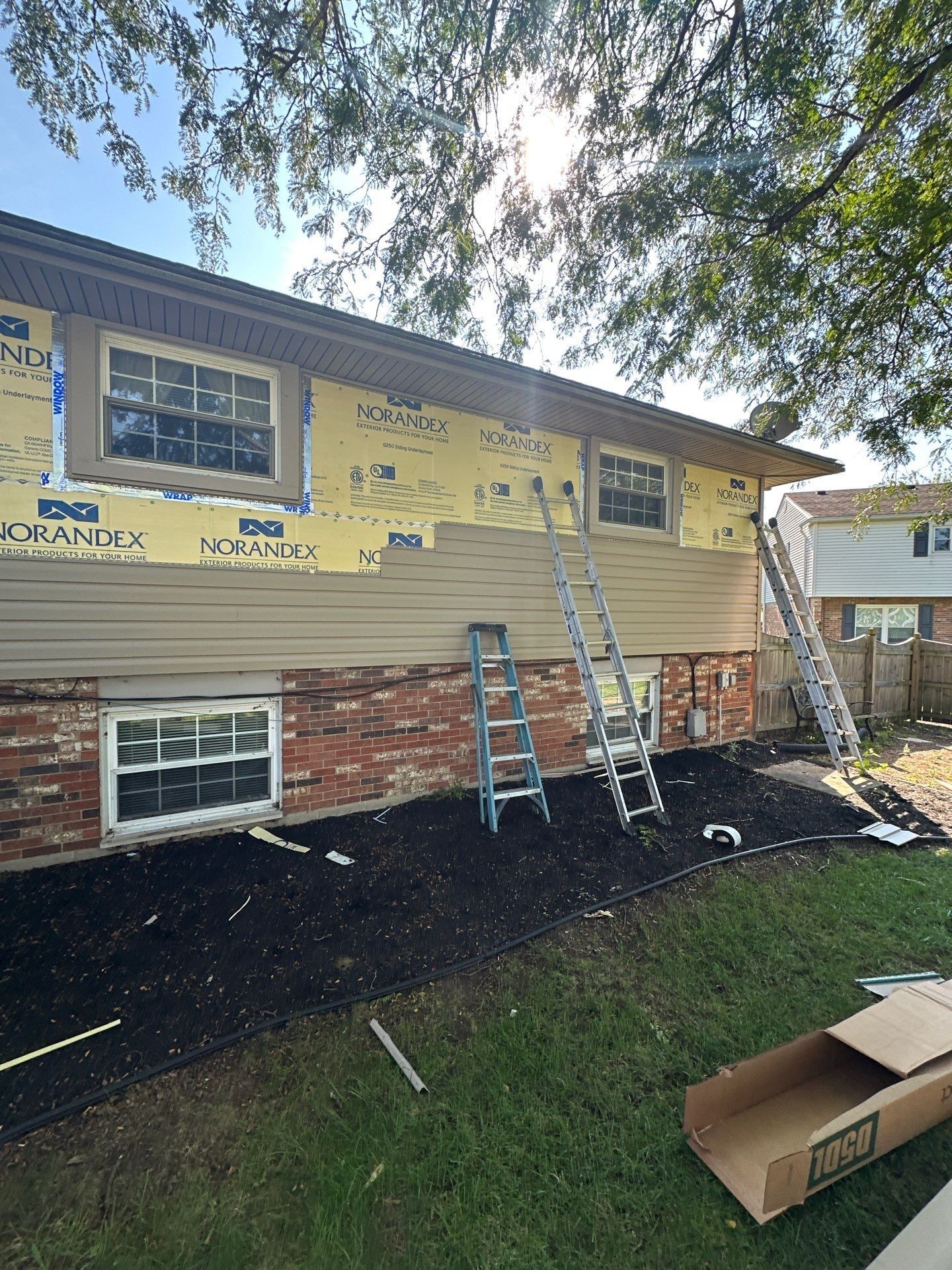 New siding going up on the lower side wall, Beavercreek, Ohio.