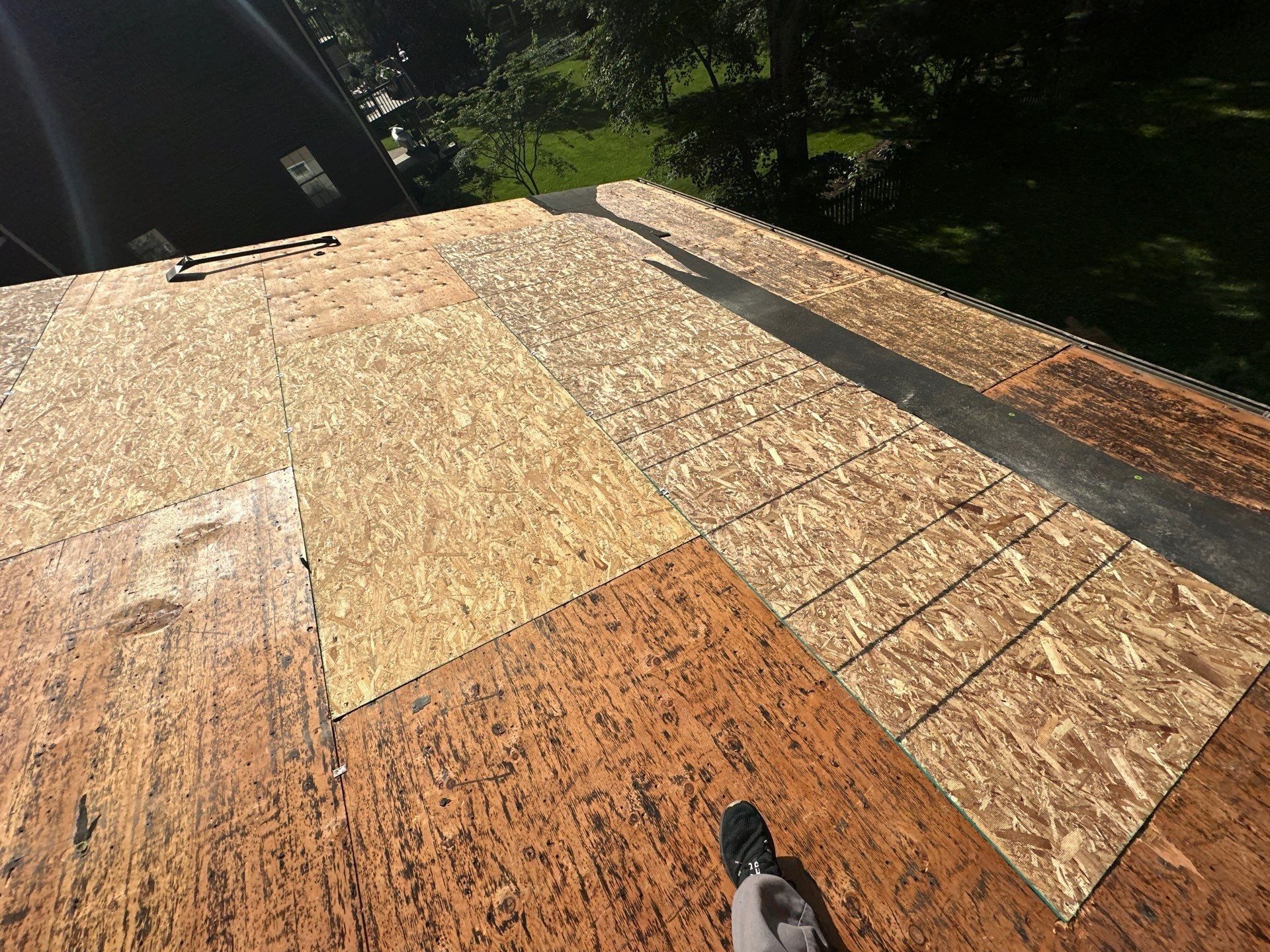 Replacement decking panels set among the original boards, Beavercreek, Ohio.