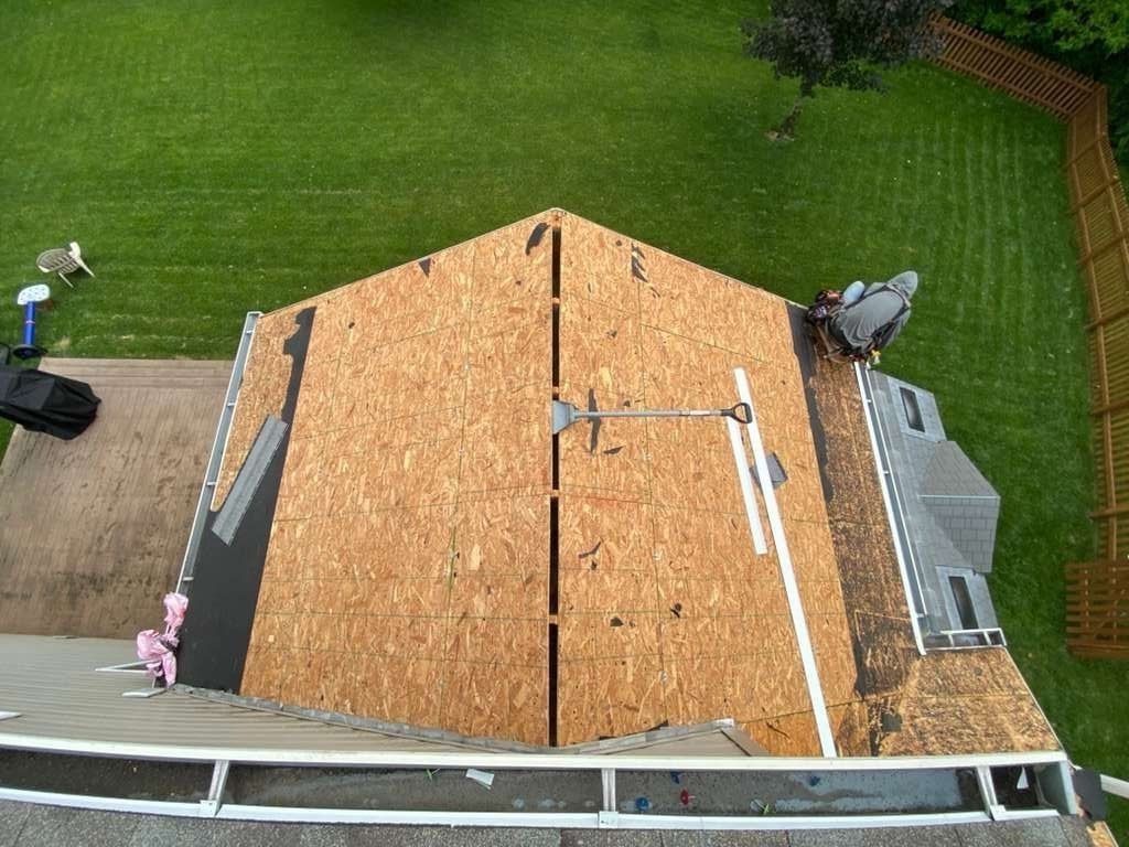 Bare roof deck and tear-off shovel
