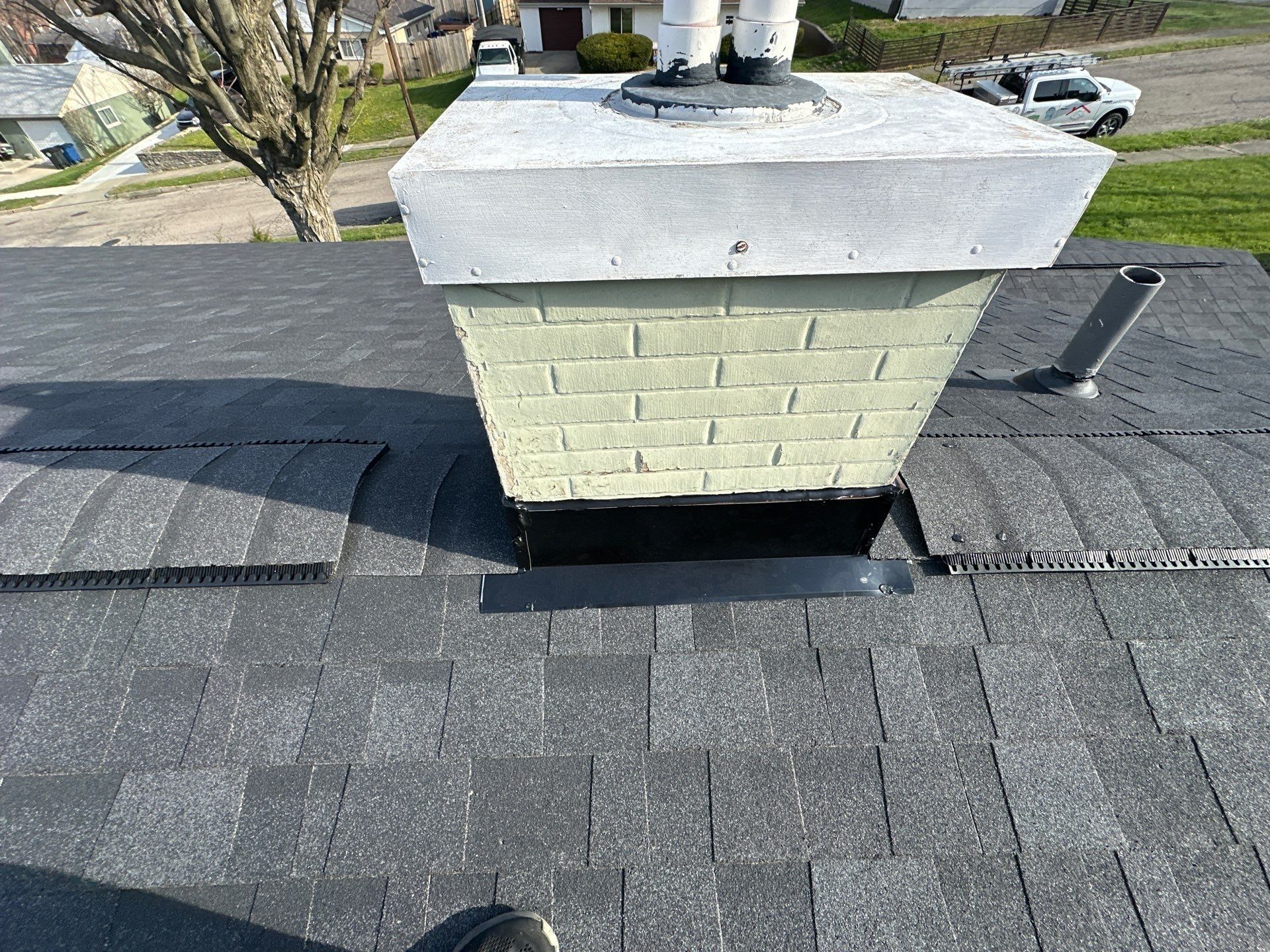 The faux chimney with new flashing and a pipe boot, Dayton, Ohio.