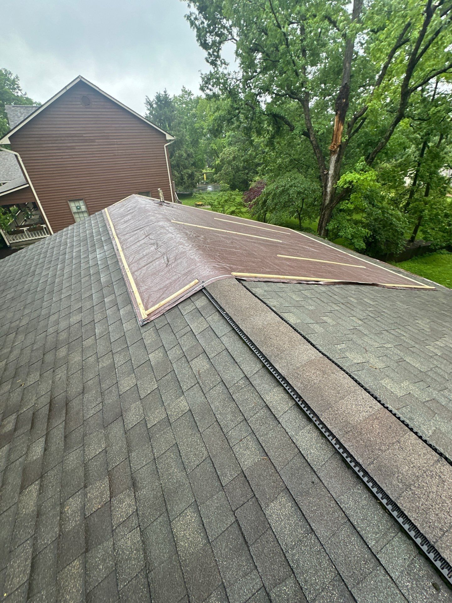 The emergency tarp across the ridge, seen from the lower roof, Beavercreek, Ohio.