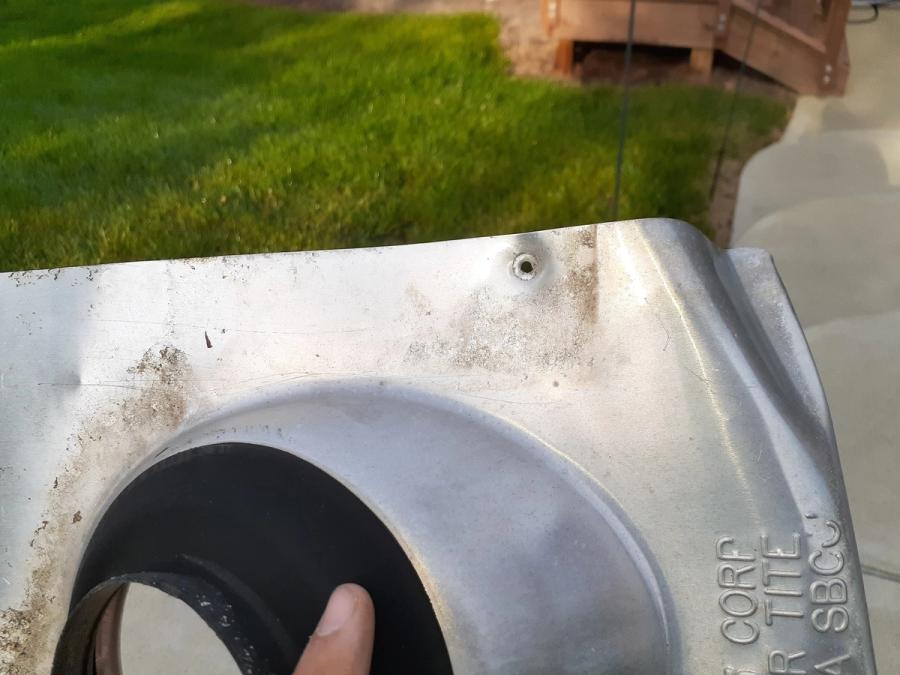 Pipe flashing and rubber collar on concrete
