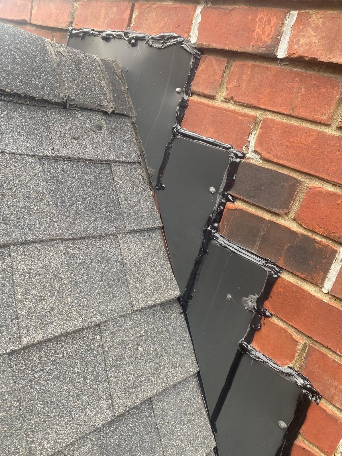 The chimney flashing after it was sealed, Xenia, Ohio.