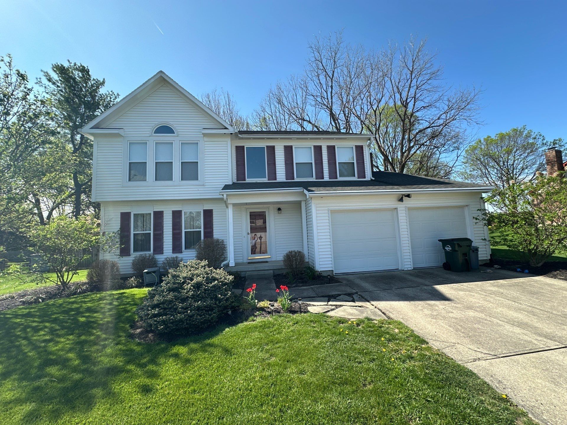 Two-story home and front lawn