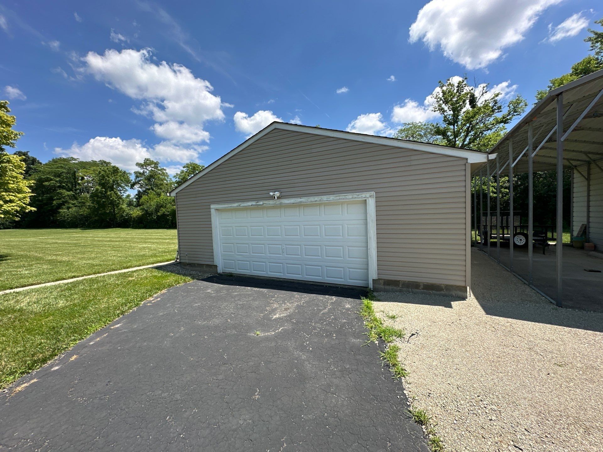 Detached garage and carport before the roof work began, Yellow Springs, Ohio.