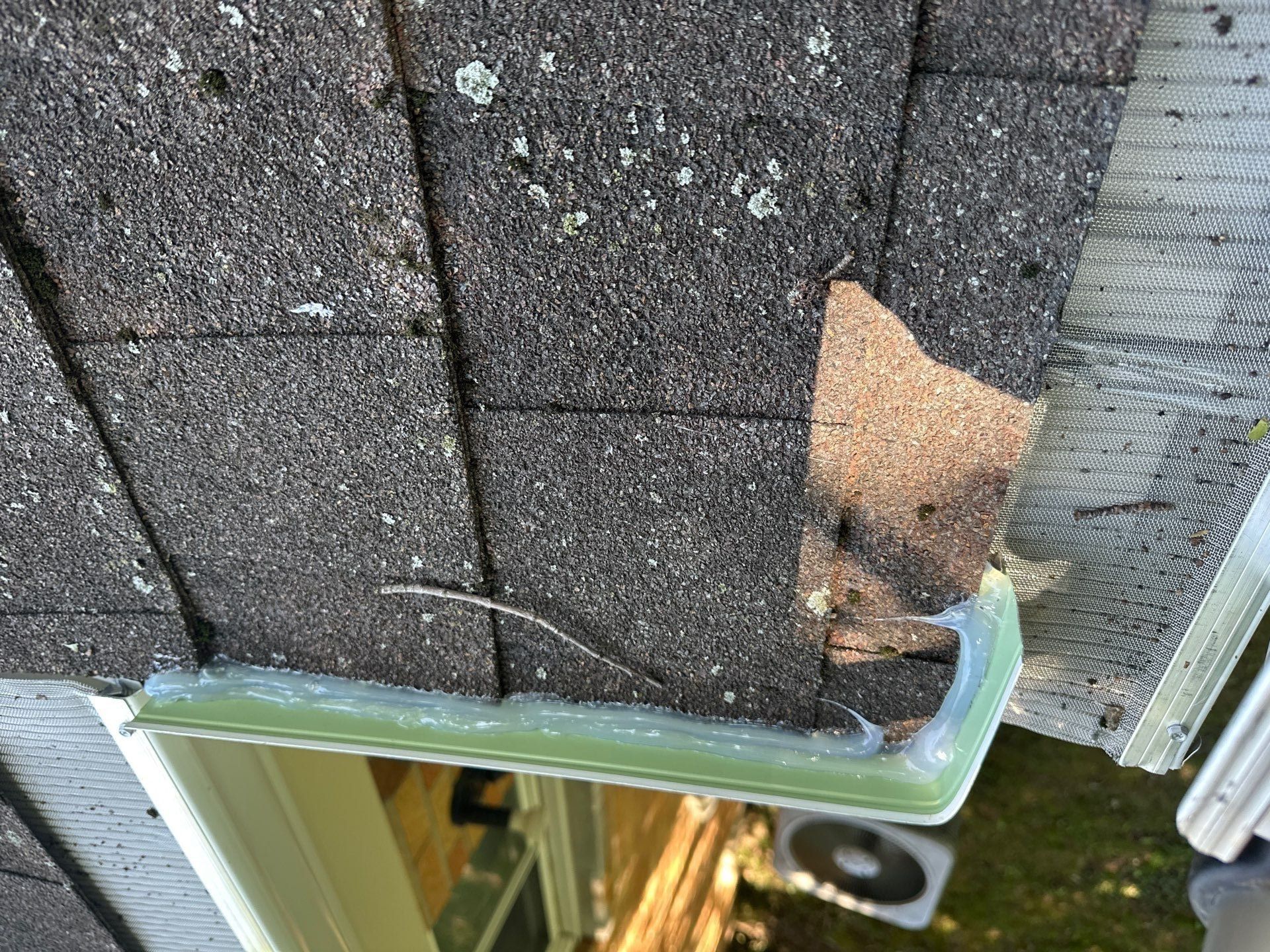 End of the gutter at the shingle edge