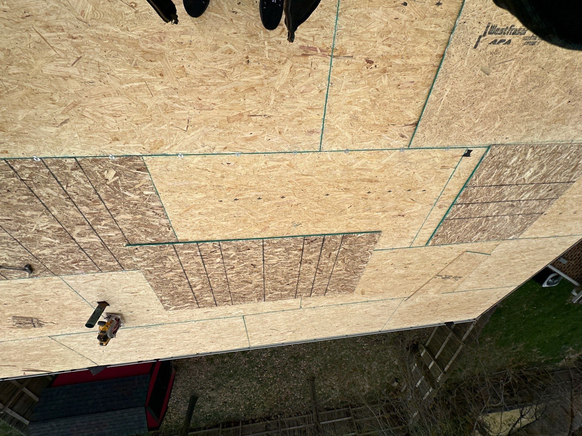 Sheathing panels over the original roof deck