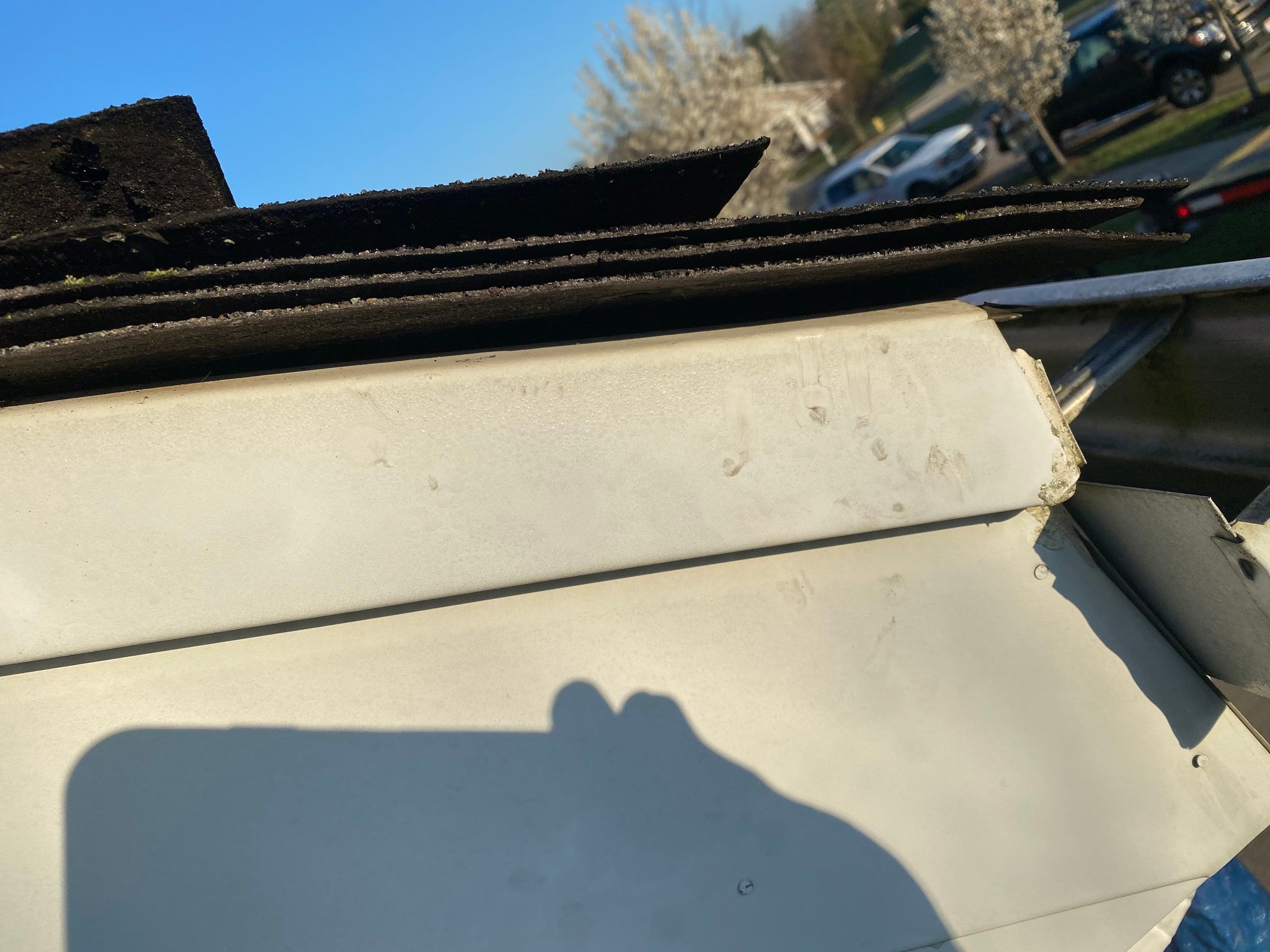 Gutter and fascia metal off the eave