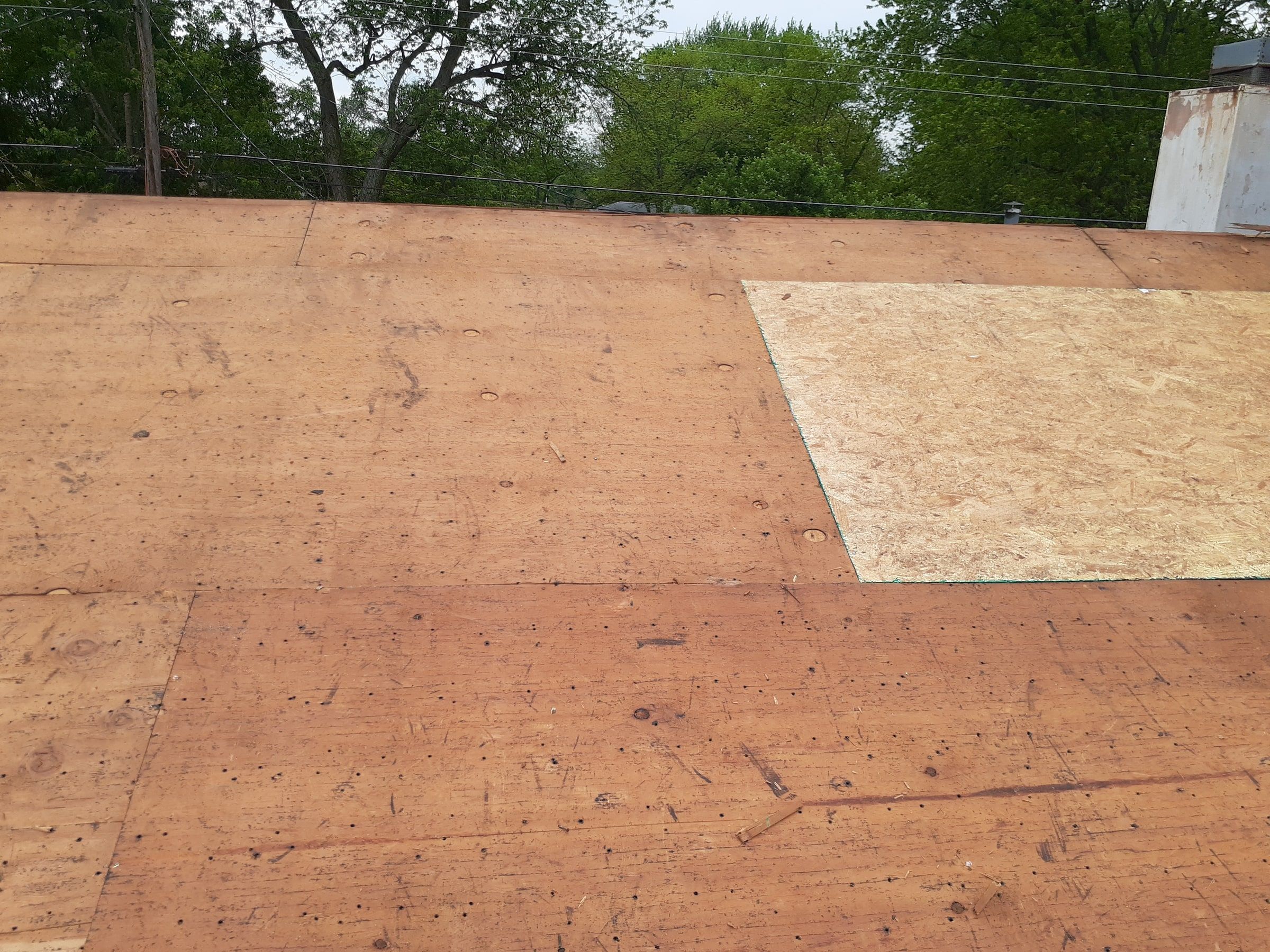A new OSB patch set into the old plywood deck, Huber Heights, Ohio.