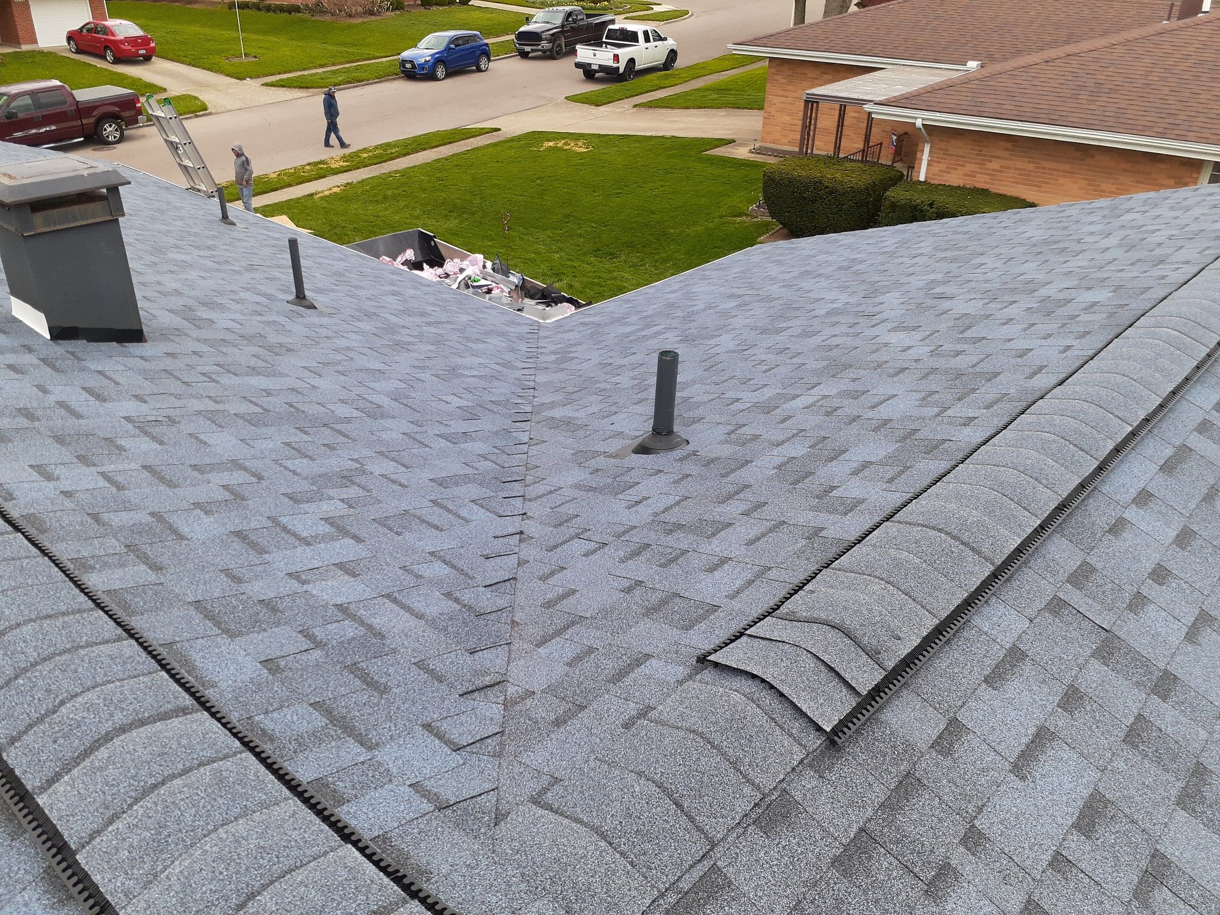 Ridge vent capped along the finished hips and ridge, Kettering, Ohio.
