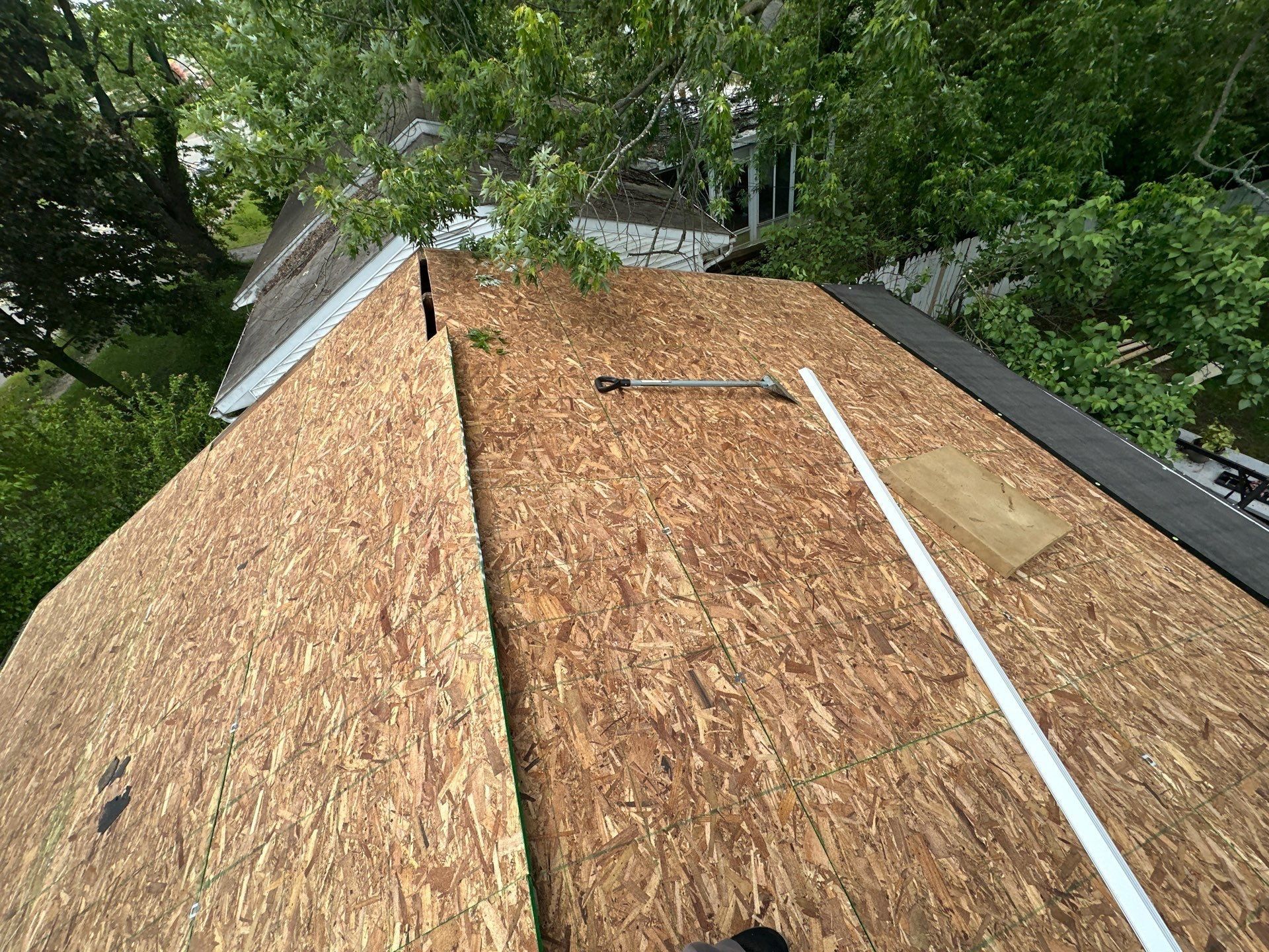 New OSB sheathing on both sides of the ridge, Dayton, Ohio.