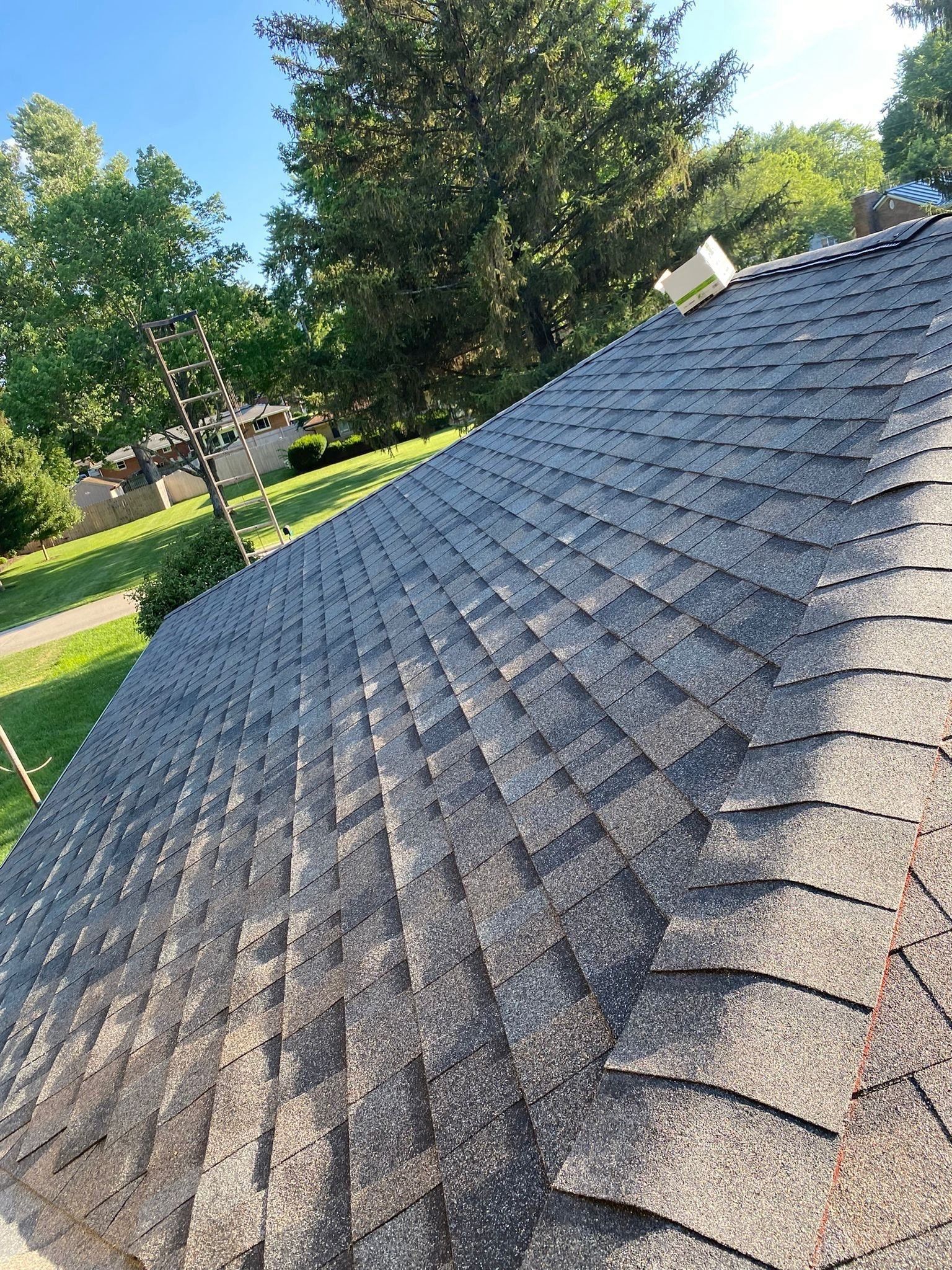 New Peppercorn shingles finished down to the edge of the hip, Beavercreek, Ohio.