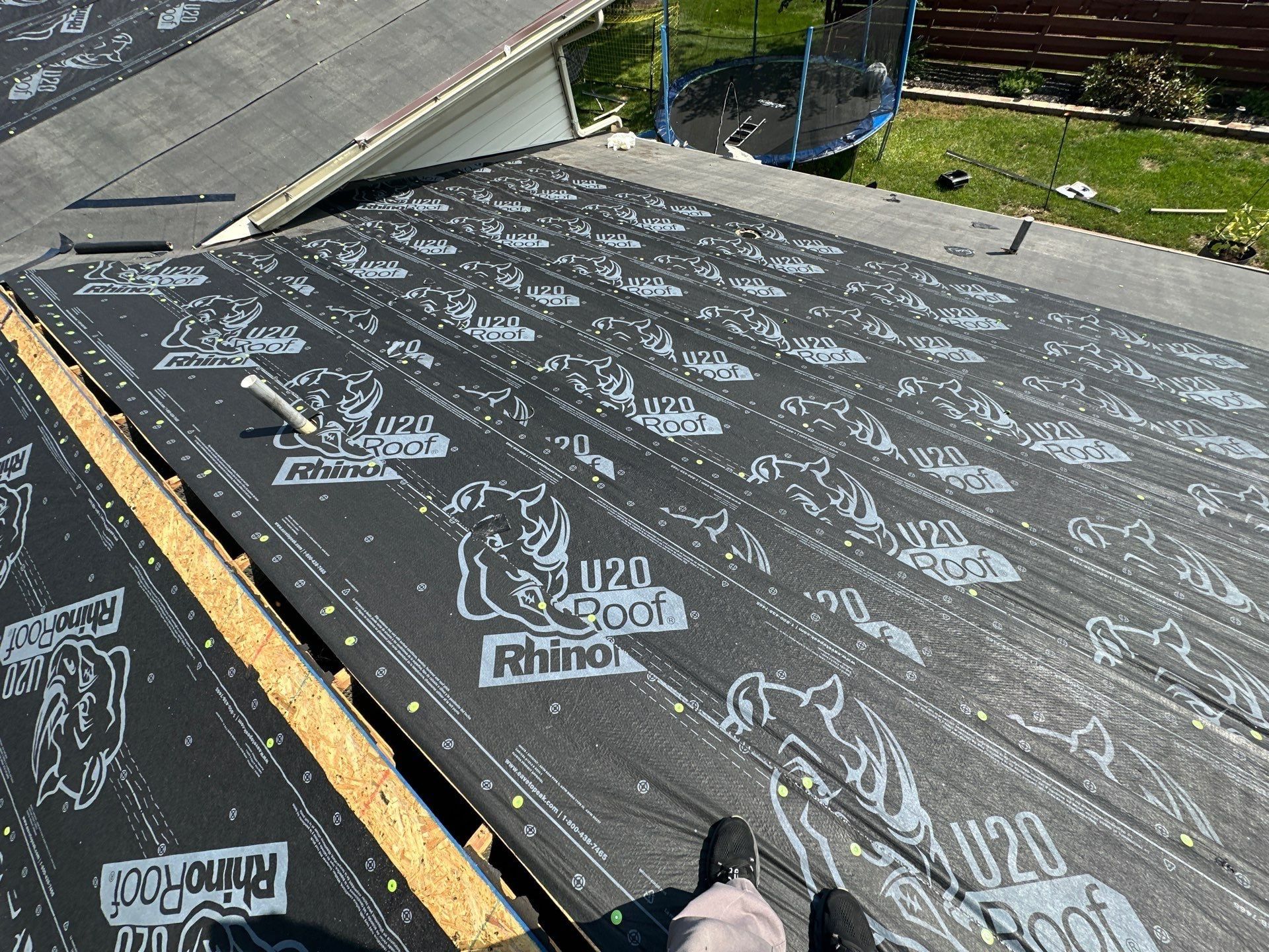 Ice and water shield along the eave with RhinoRoof underlayment above it, Dayton, Ohio.