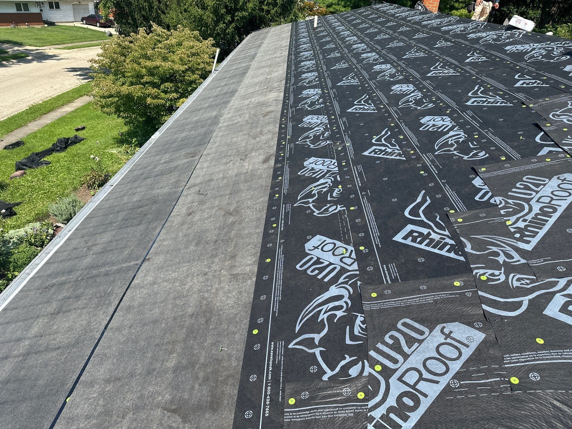RhinoRoof synthetic underlayment over the ice and water shield along the front of the roof, Fairborn, Ohio.