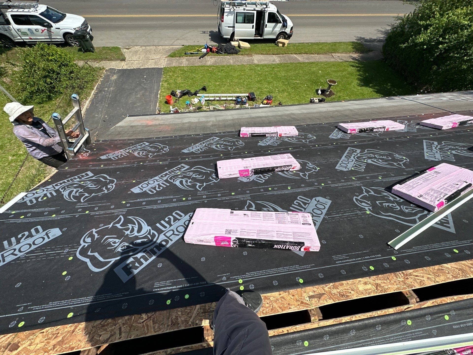 Shingle bundles staged across the underlayment, Dayton, Ohio.