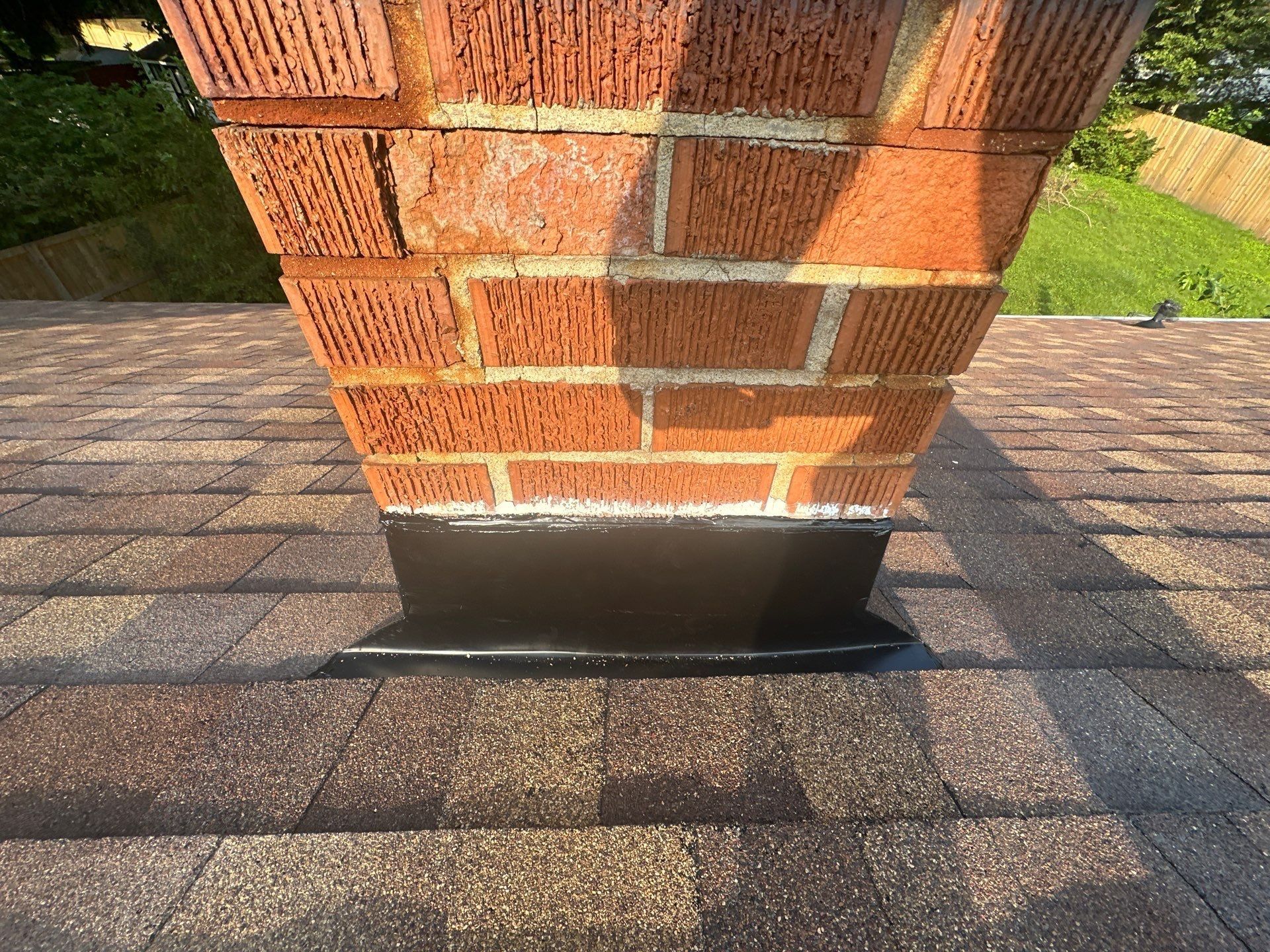 The new flashing along the low side of the chimney, Fairborn, Ohio.