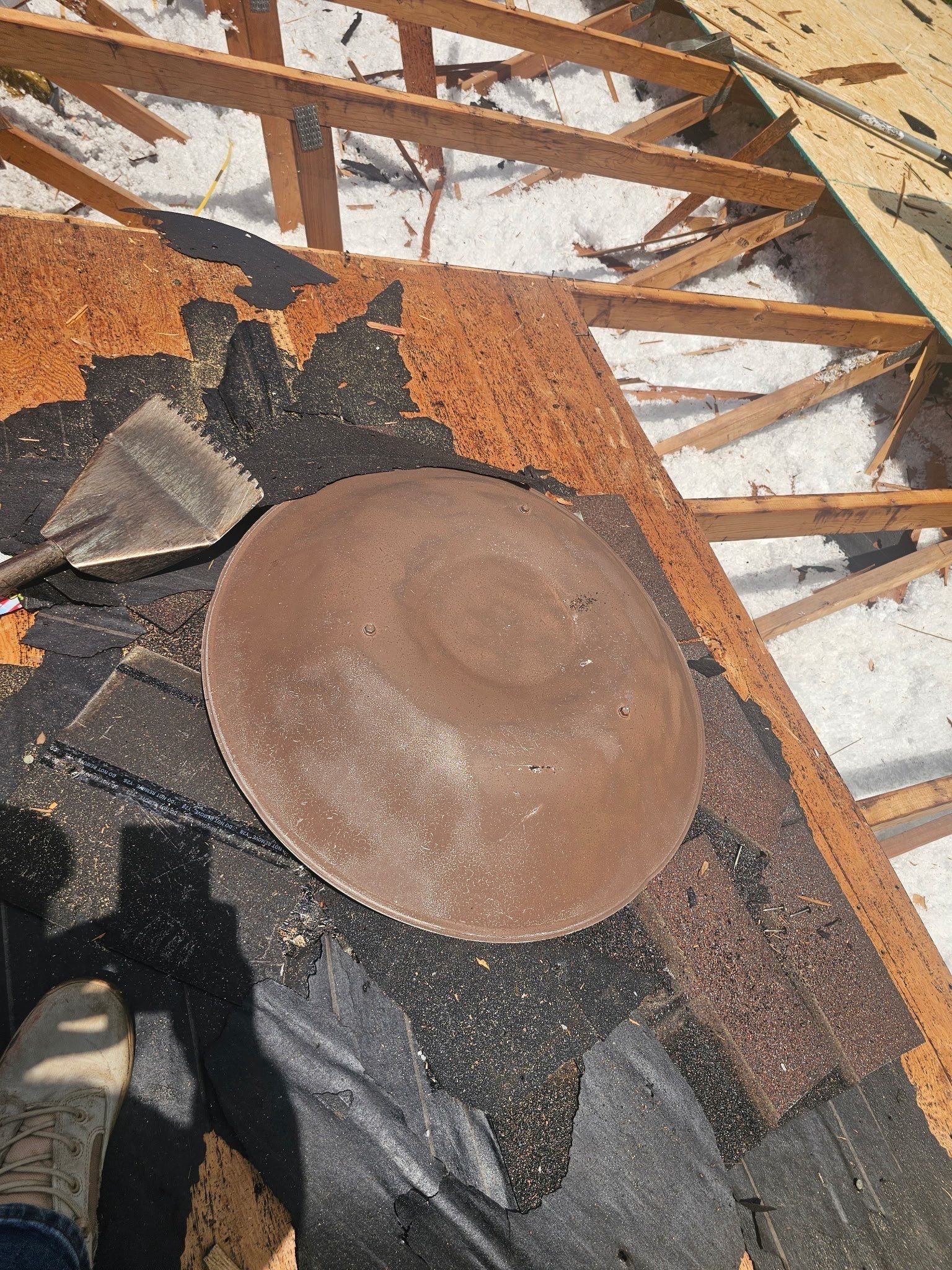 An old vent and the open rafters where the damaged deck came off, Beavercreek, Ohio.