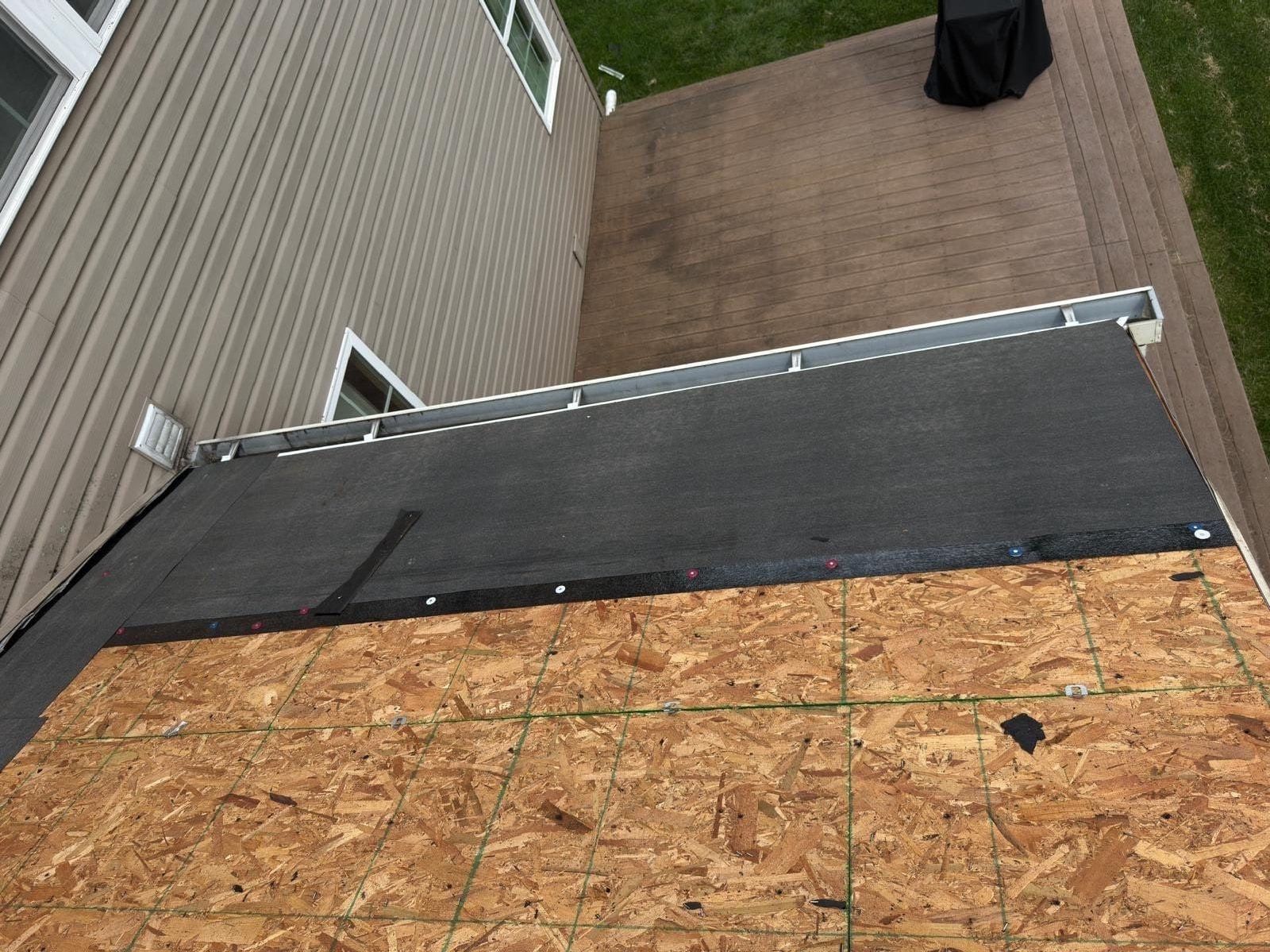 Deck along the side above the siding