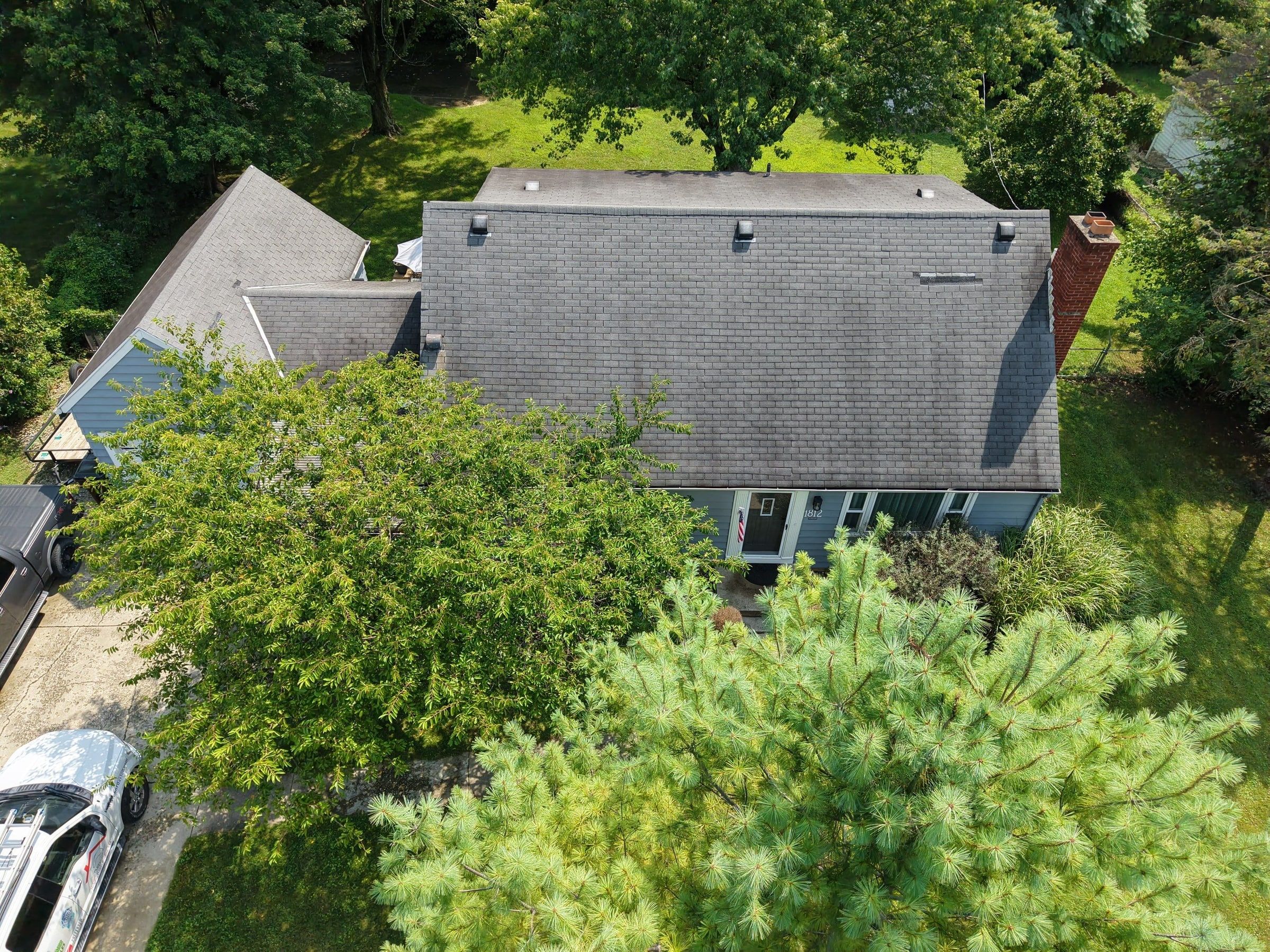 The old roof from the air, over the front yard trees, Beavercreek, Ohio.