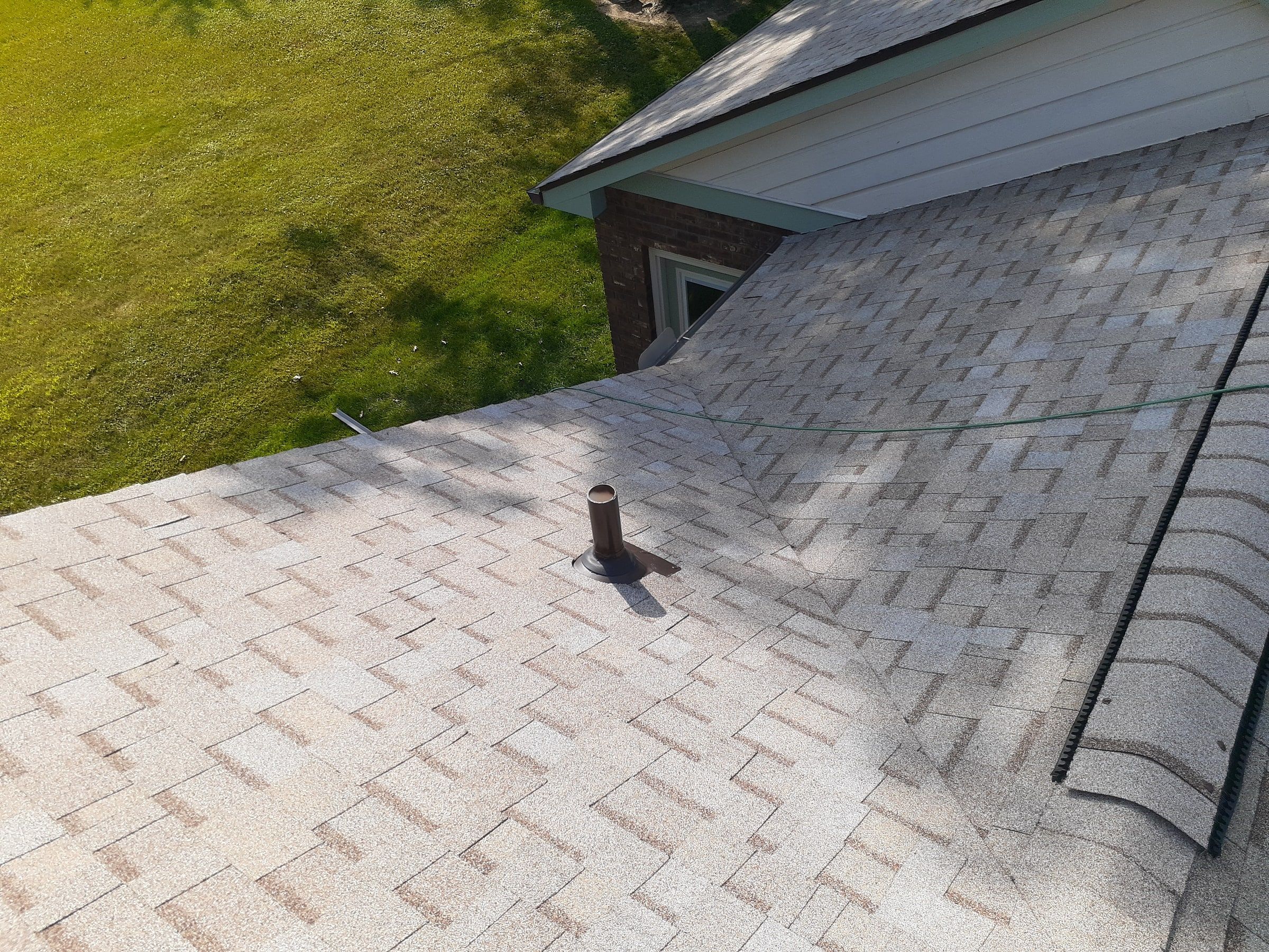 Finished slope with a pipe vent below the dormer wall, Jamestown, Ohio.