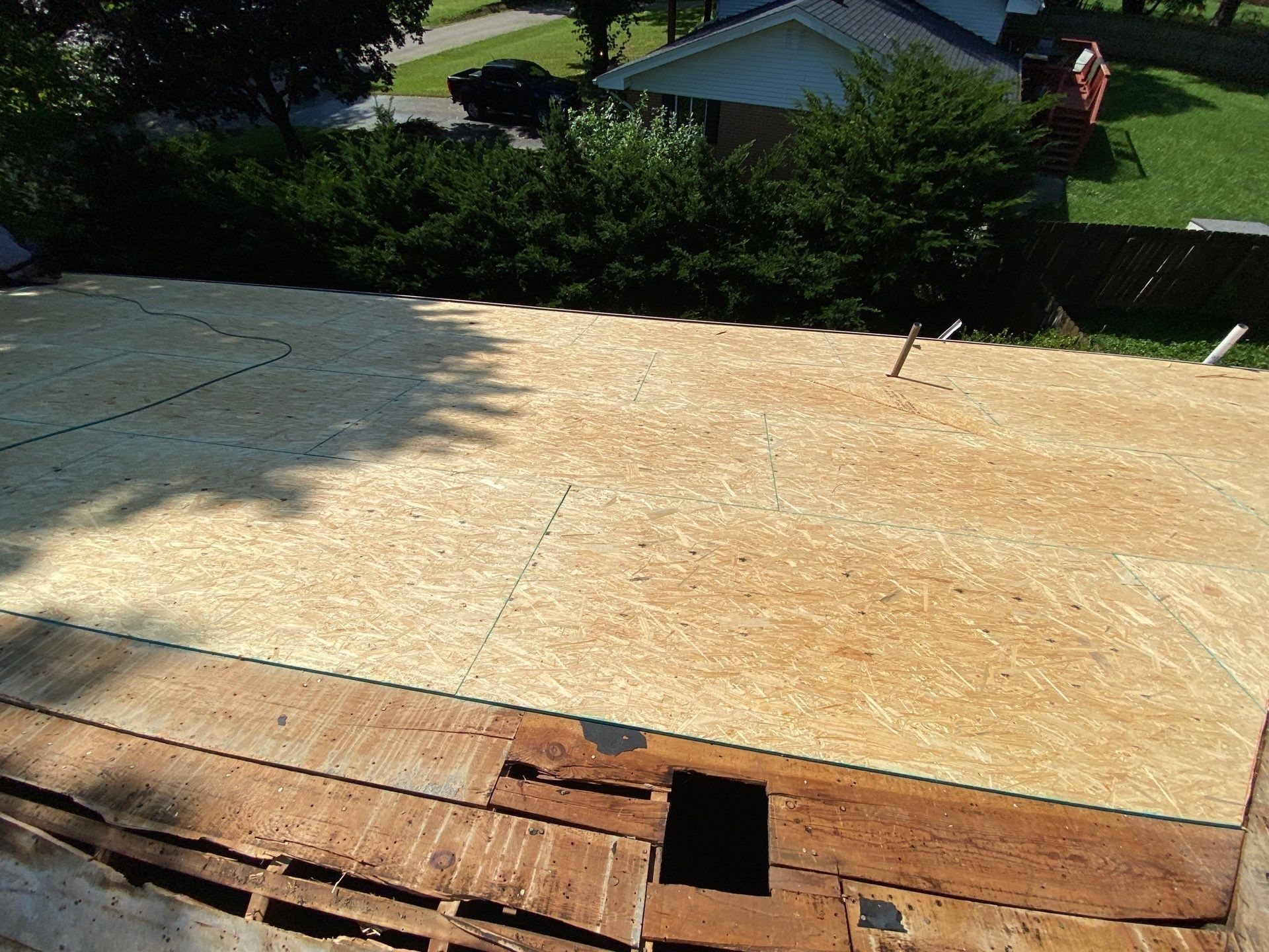 New sheathing installed above a broken section of plank decking, Beavercreek, Ohio.