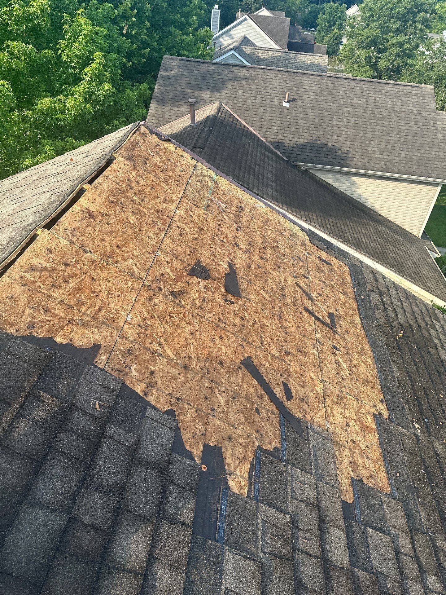 The damaged shingles removed down to the deck for the first repair, Kings Mills, Ohio.