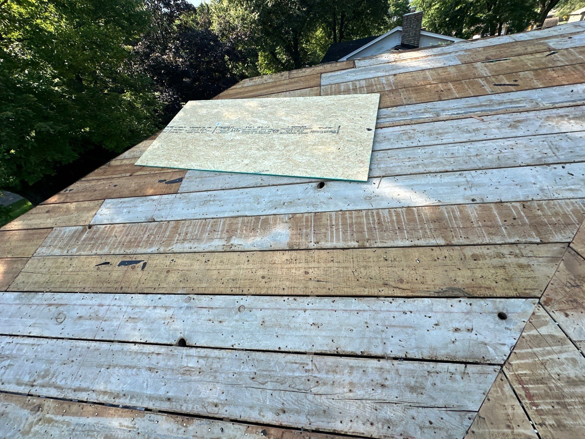 First new wood sheet laid over the old plank deck, Beavercreek, Ohio.