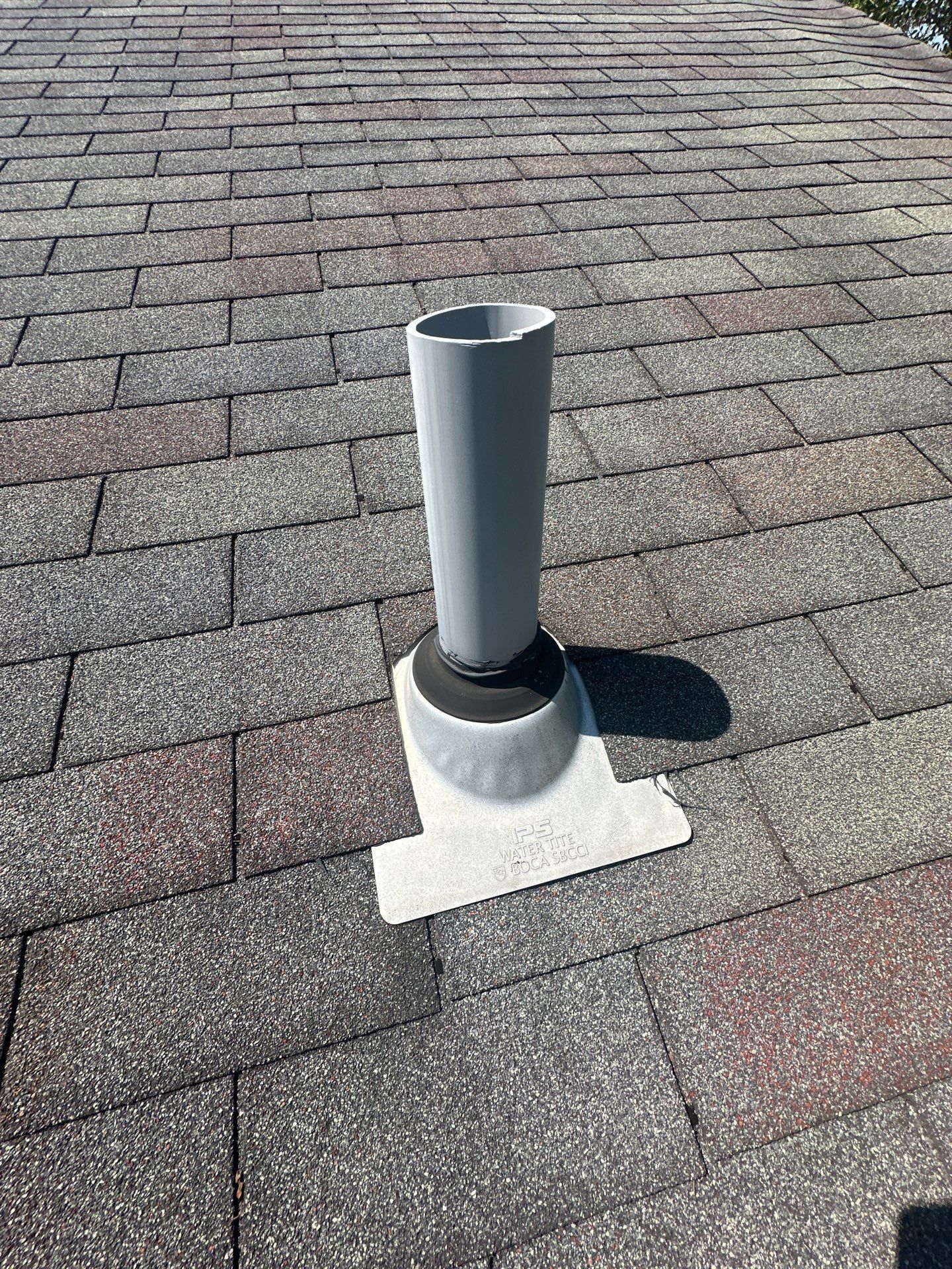 An old plumbing vent boot on the worn shingles, West Carrollton, Ohio.