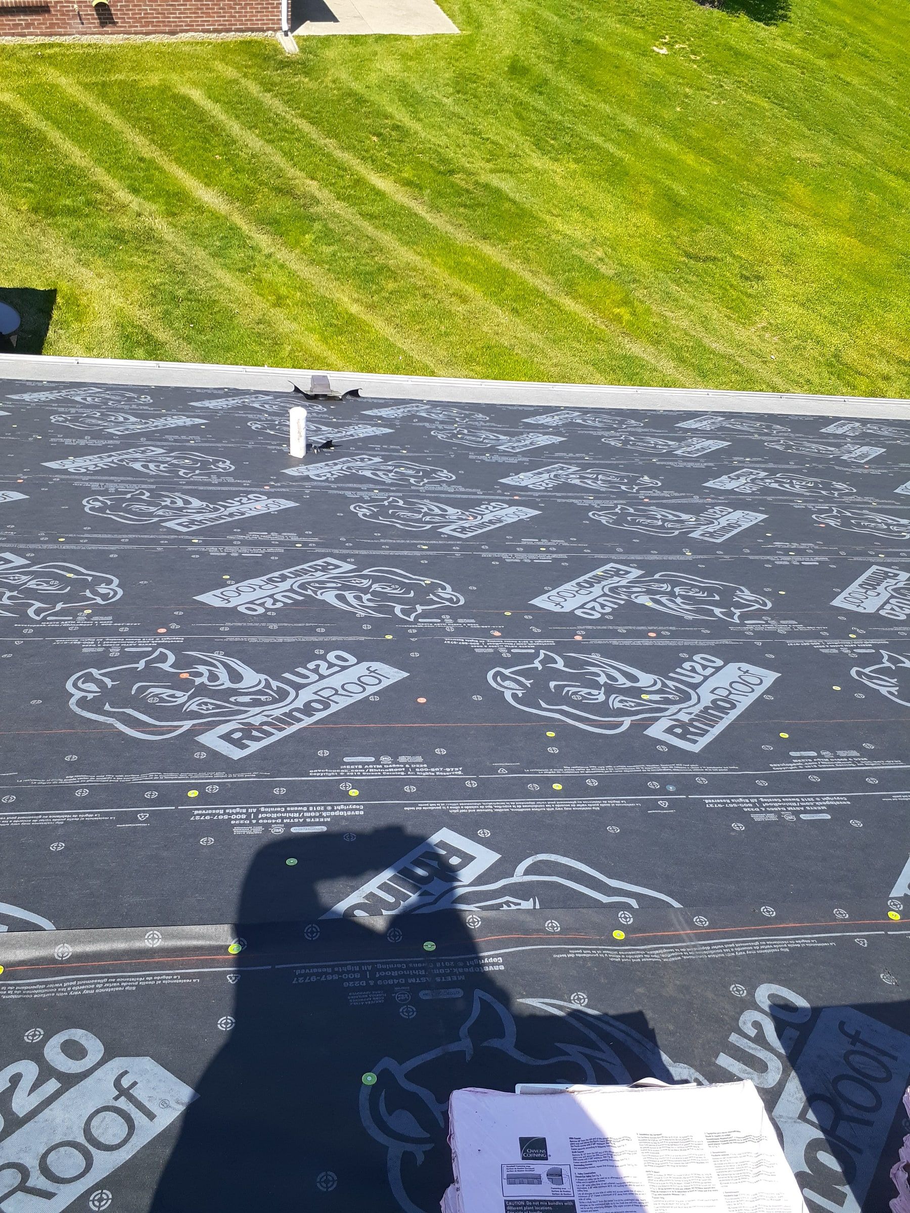 RhinoRoof cap nailed and gutter apron