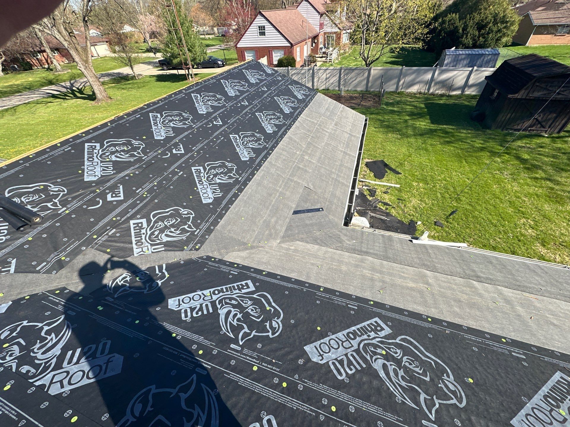 Grey membrane lining the valley between underlayment covered slopes, Beavercreek, Ohio.
