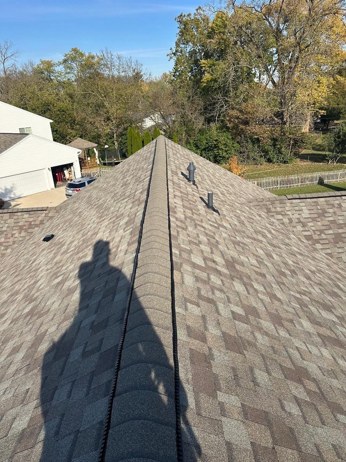 The new ridge cap running the length of the main roof, Beavercreek, Ohio.