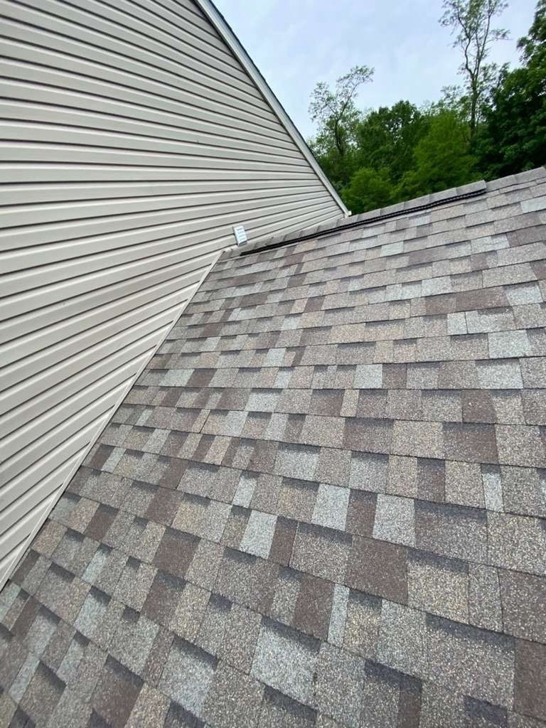 Roof meeting the sided wall