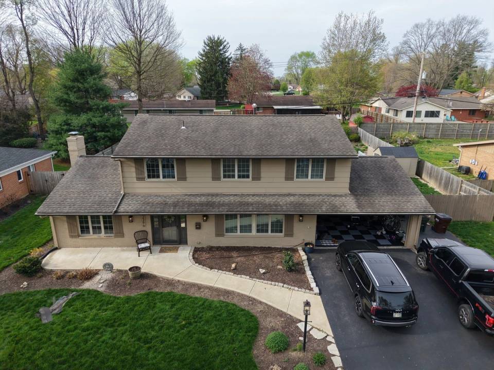 Drone view of the two-story house during the roof inspection, Kettering, Ohio.