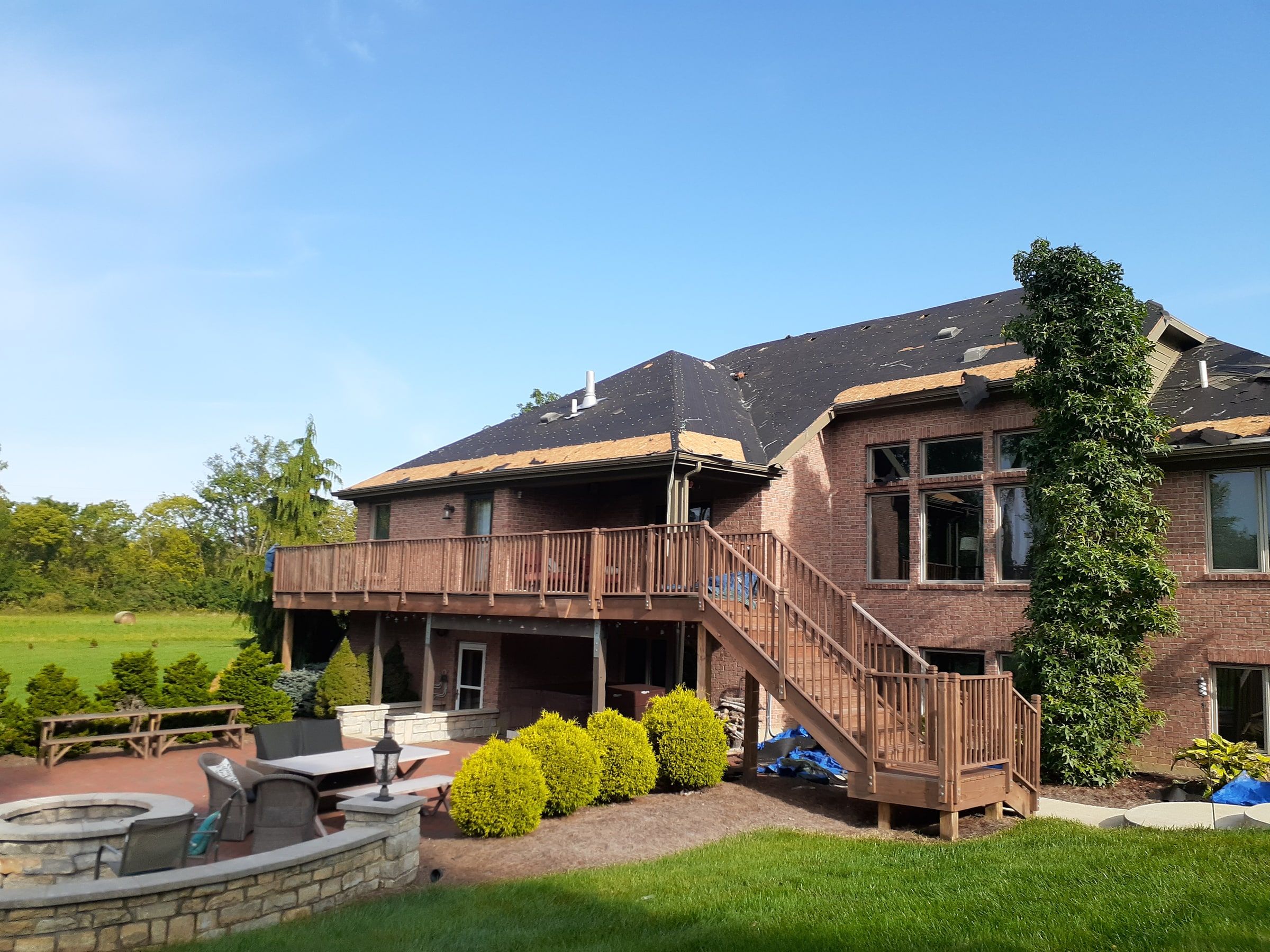 Rear elevation, patio and fire pit