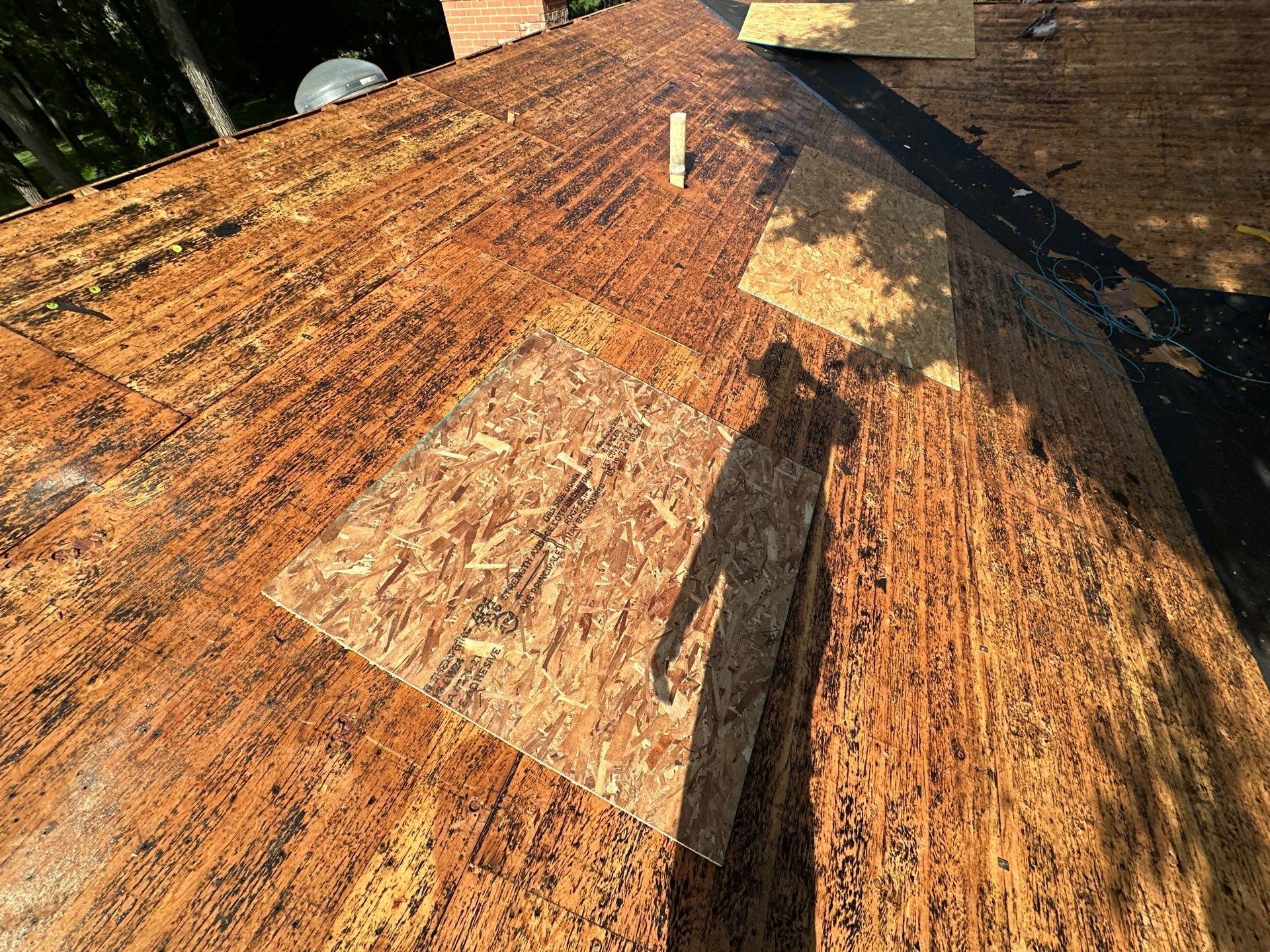 New sheathing panel in the stripped deck