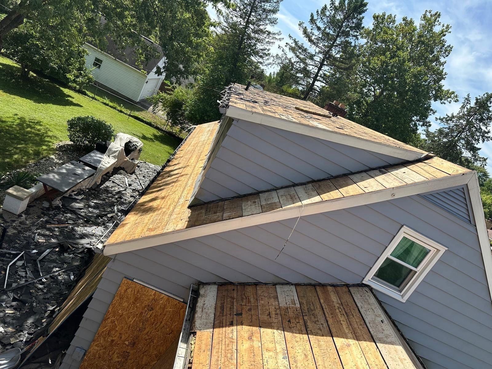 The plank deck bare along the dormer, after tear-off, Beavercreek, Ohio.