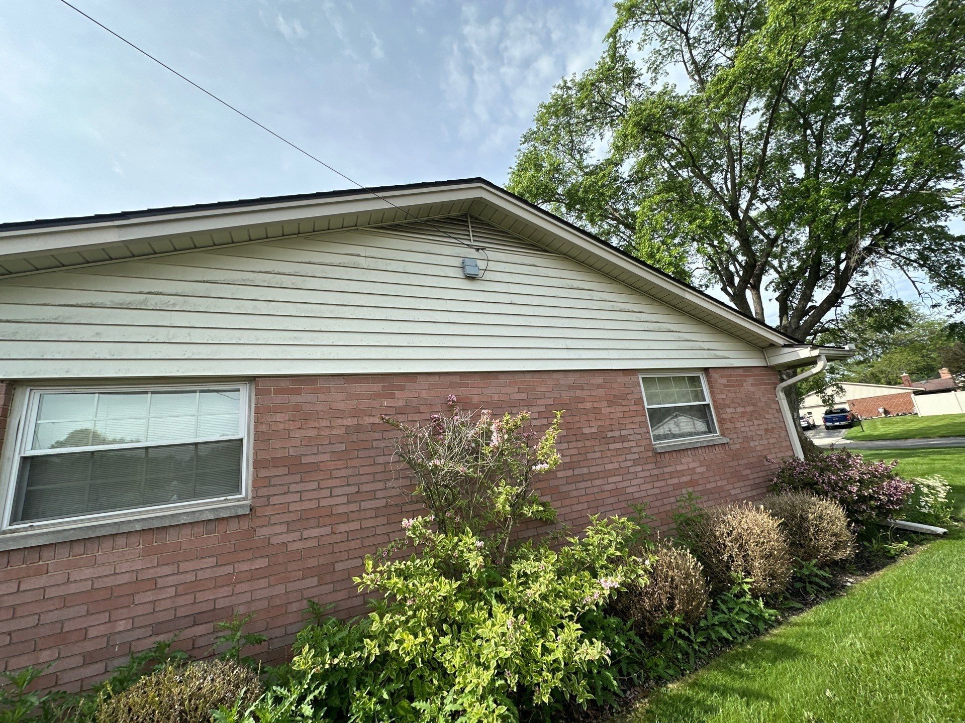 The repaired gable fascia on the brick ranch, Kettering, Ohio.