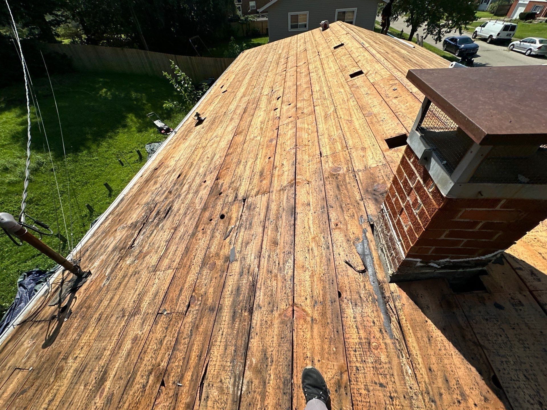 The board deck cleaned around the chimney and its cap, Fairborn, Ohio.