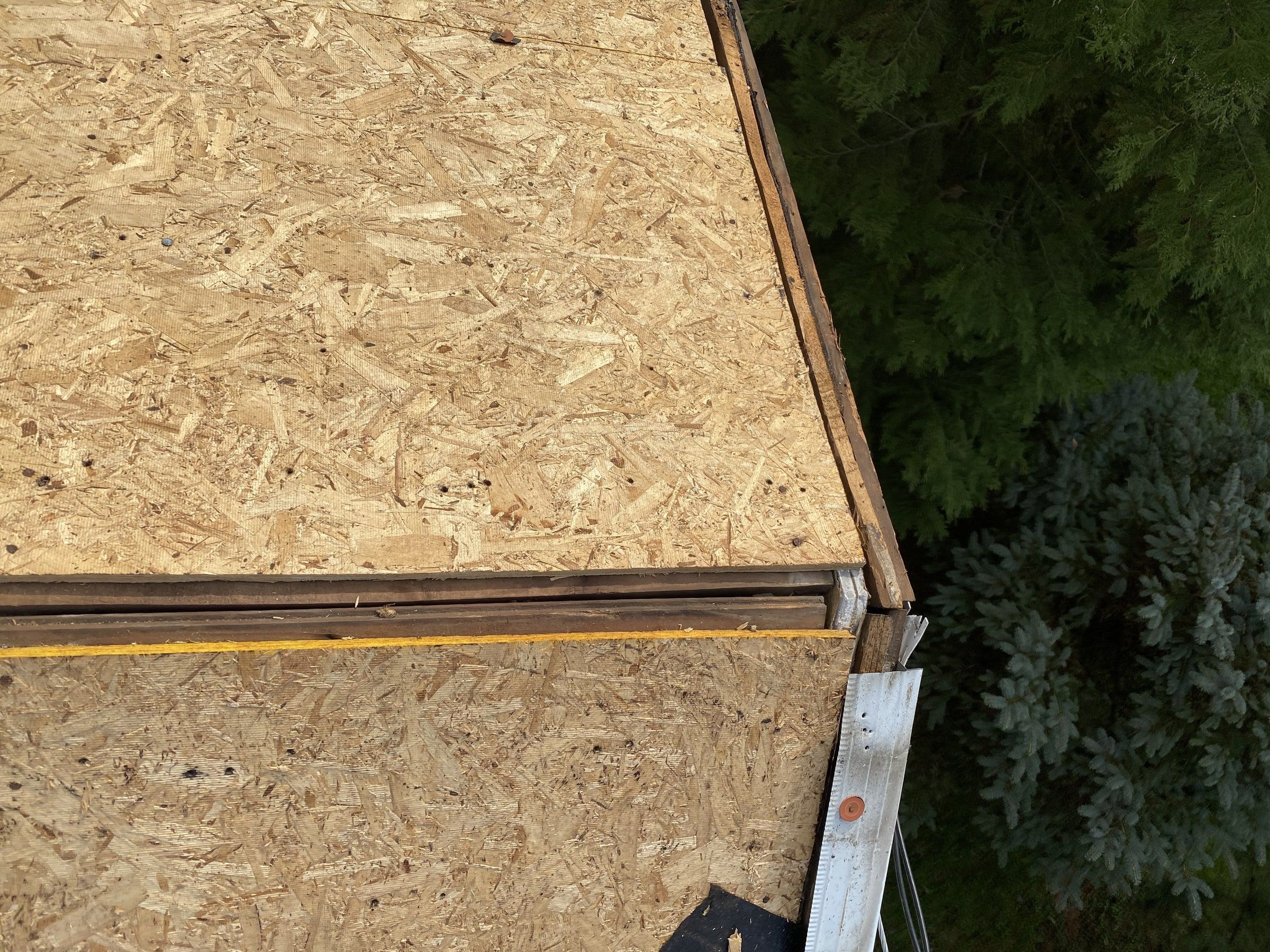 New OSB at the roof edge, with white drip edge along the eave, Yellow Springs, Ohio.