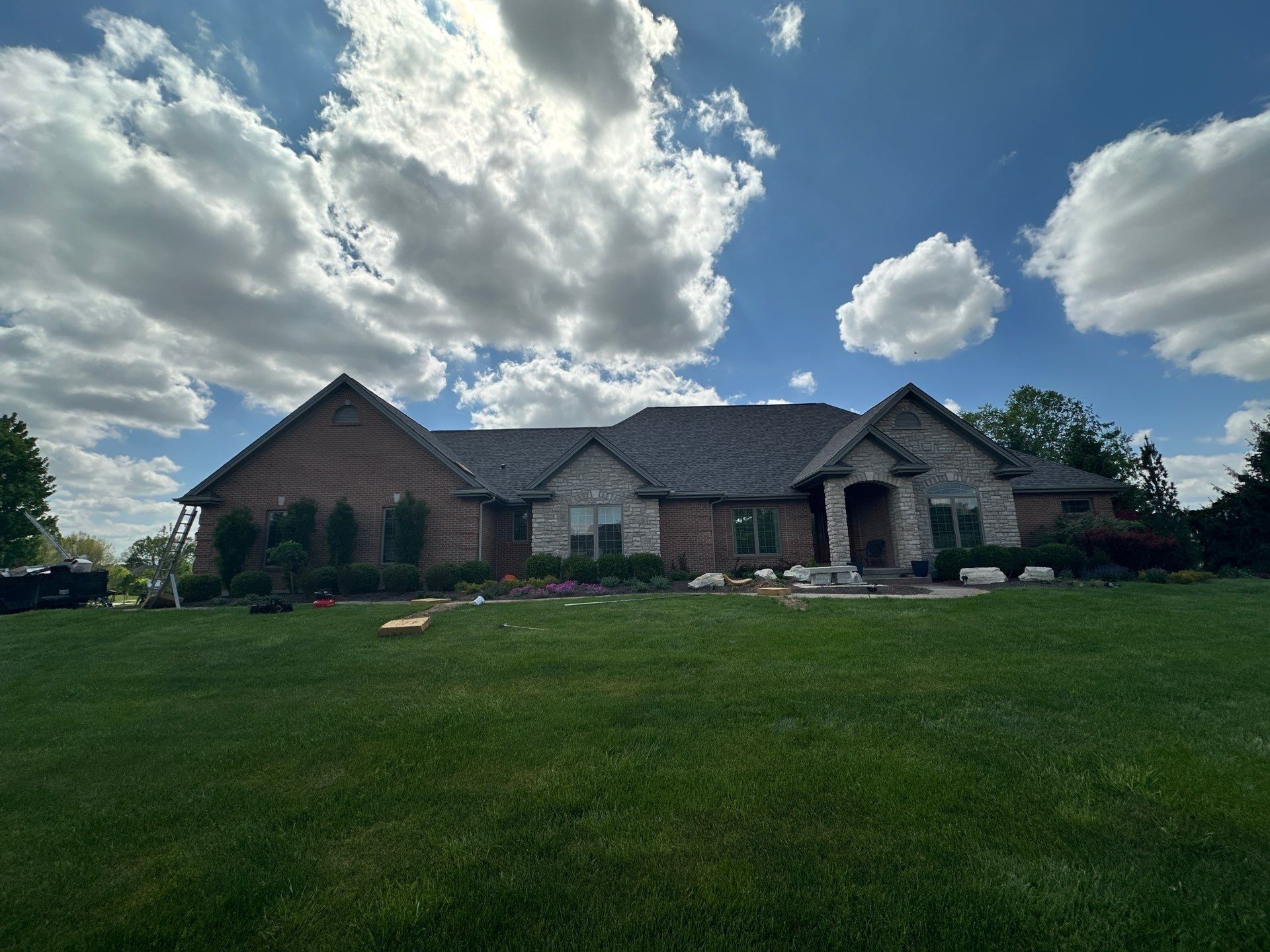 Brick and stone ranch, full front