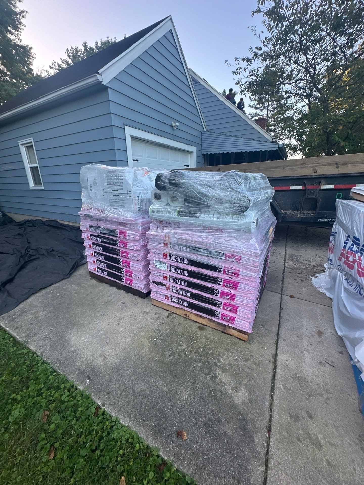 Pallets of new shingles on the driveway, Beavercreek, Ohio.