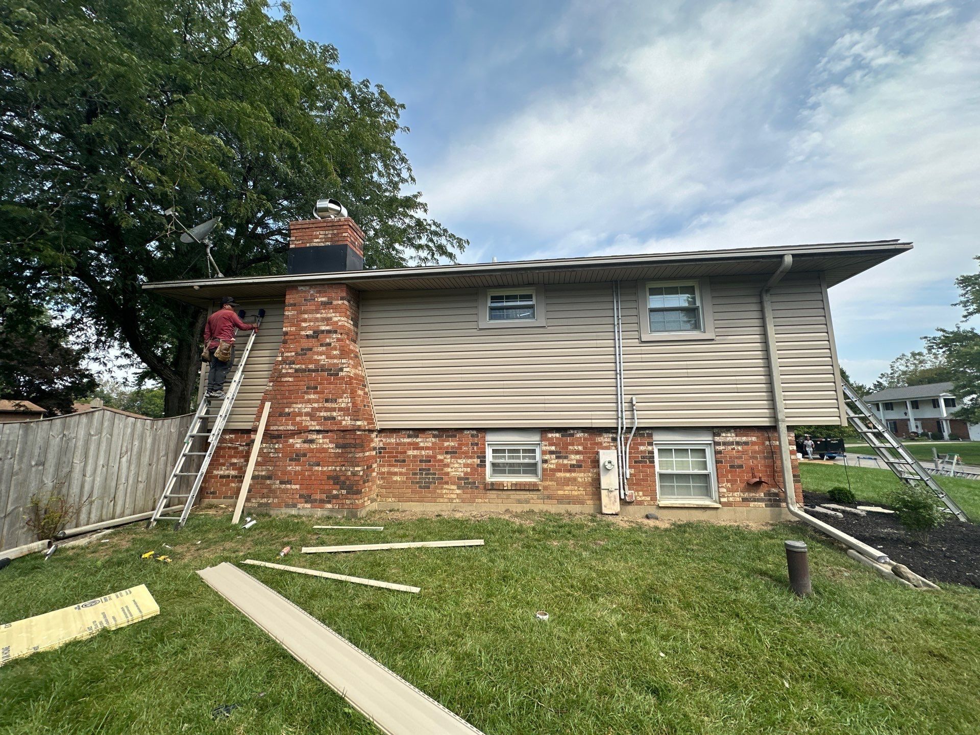 The back of the house in new siding, as the last pieces go on, Beavercreek, Ohio.