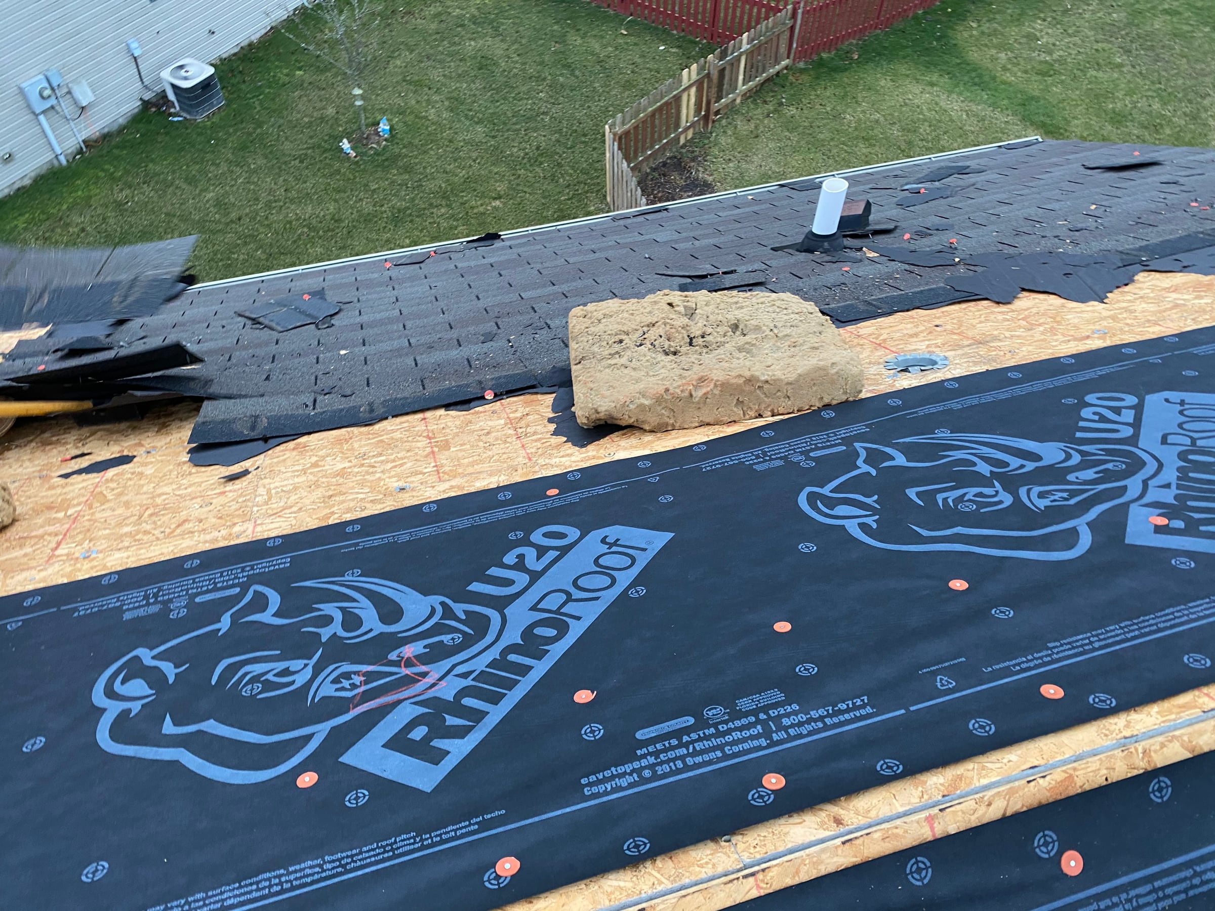 Bare decking above, underlayment below