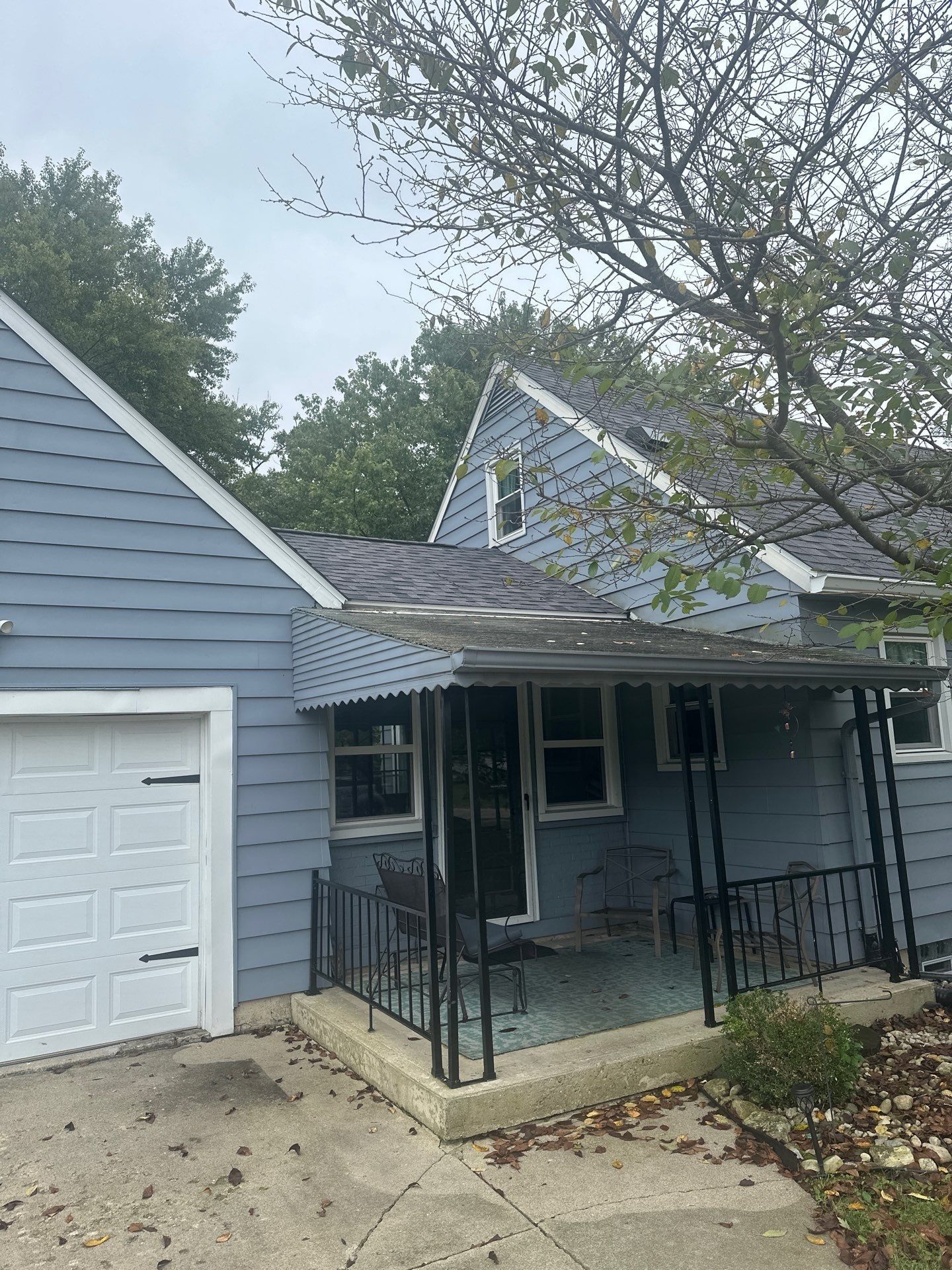 The finished roof over the side porch and garage, Beavercreek, Ohio.