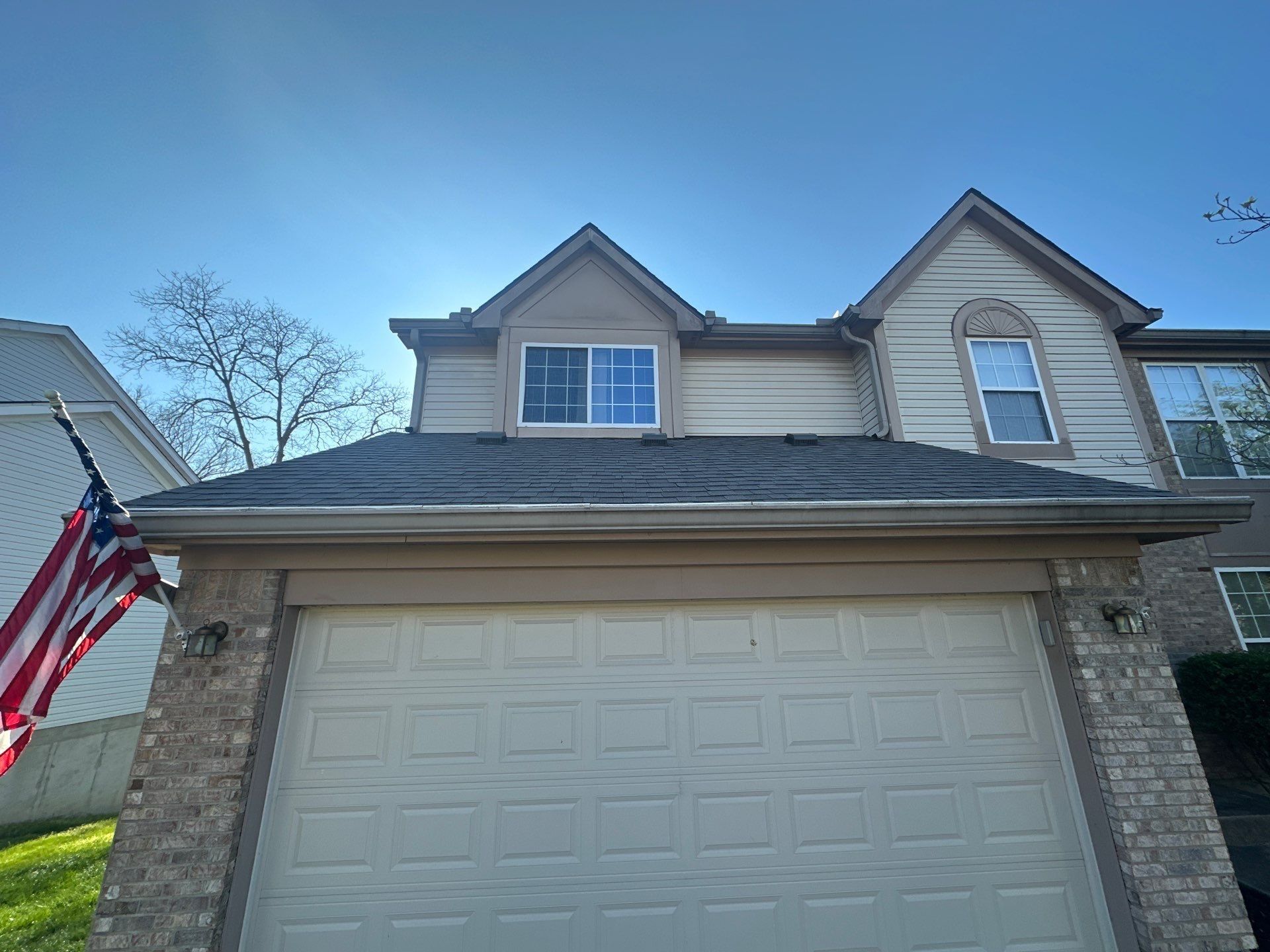 Flag, garage roof and two gables
